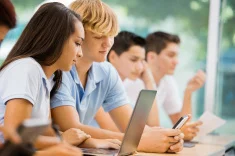 stock-photo-30267266-students-using-new-technology-in-private-high-school (1).jpg