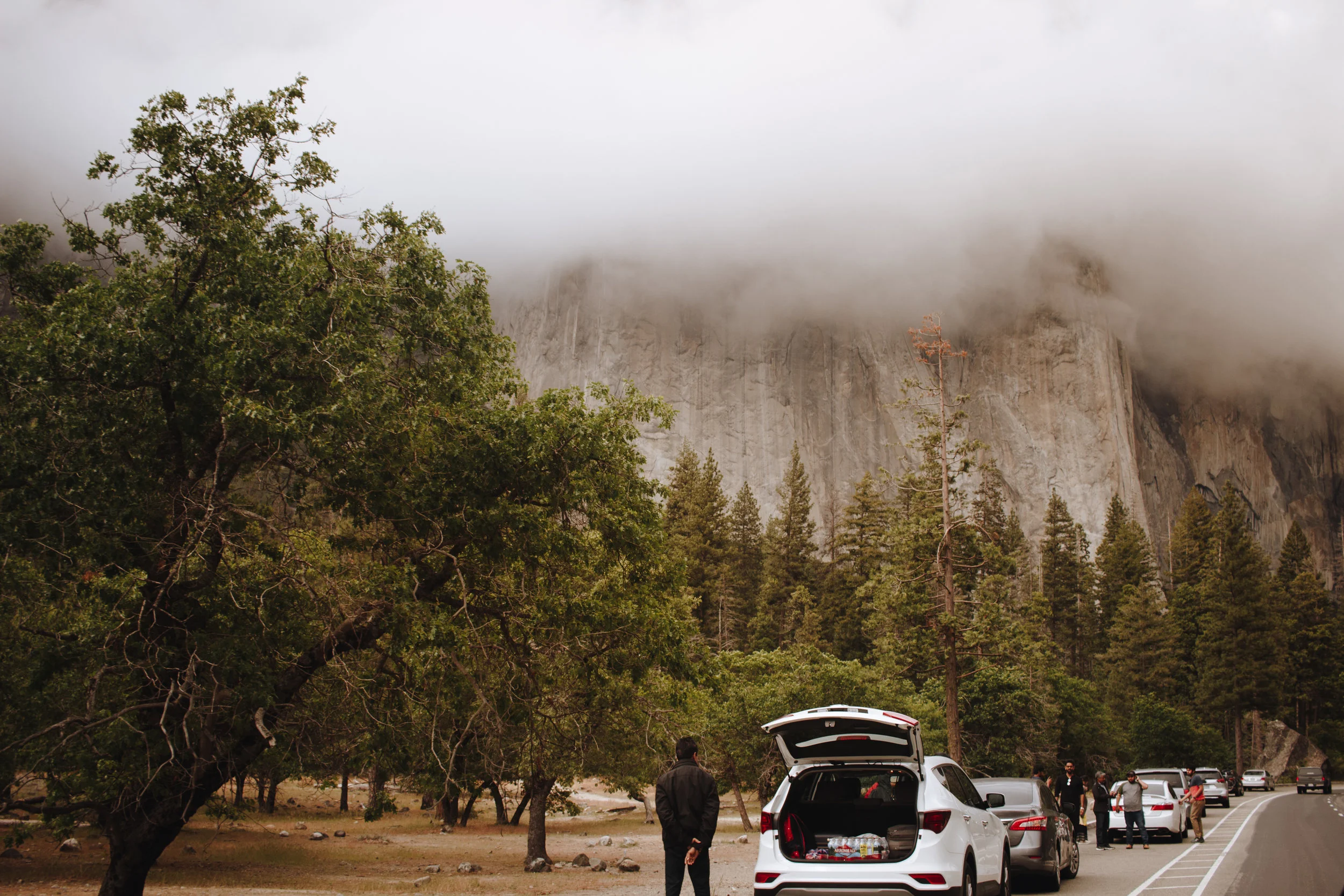 The drive in- parking along the road.