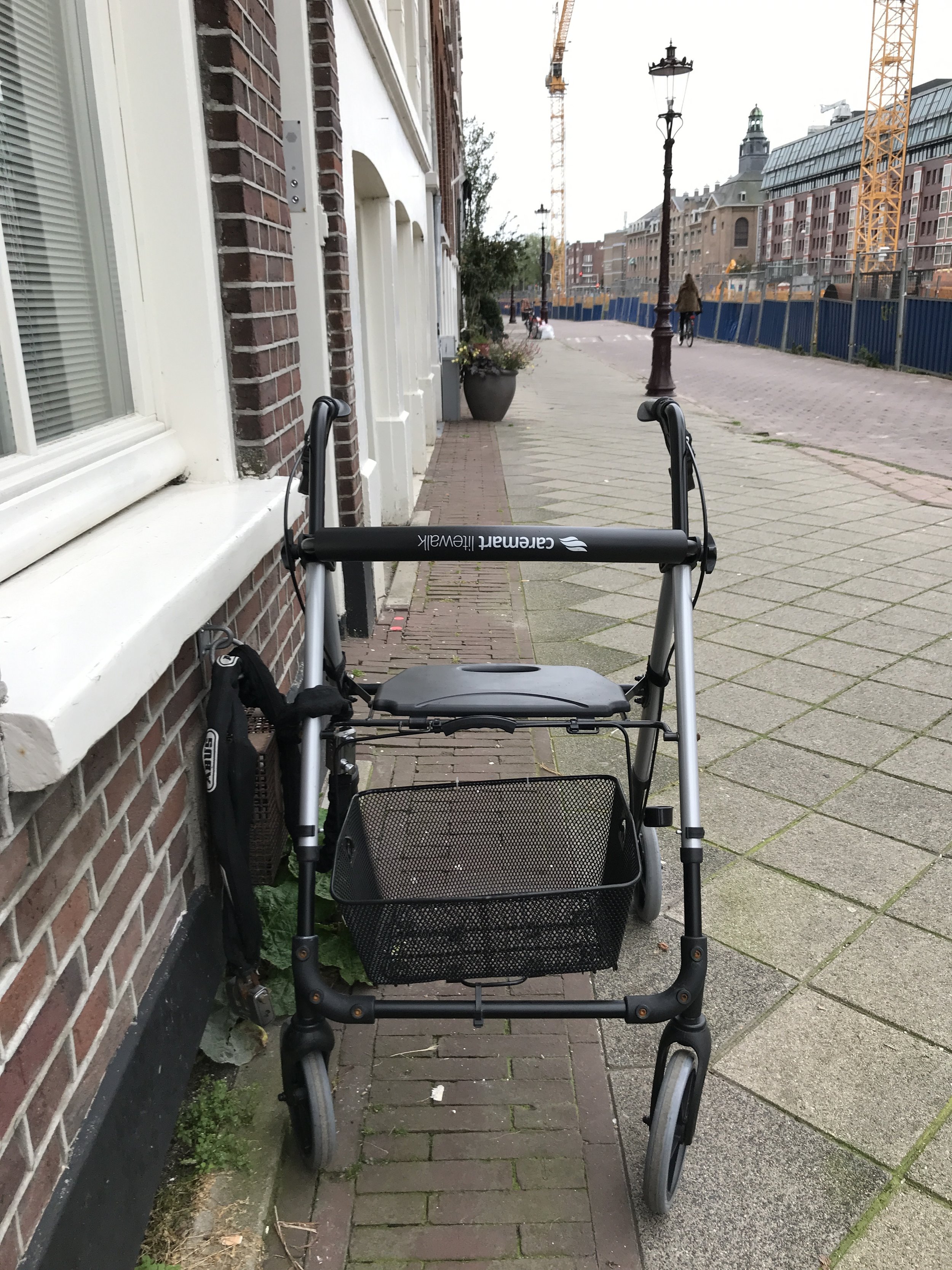 Dutch people lock up strollers & walkers just like they lock bikes. 