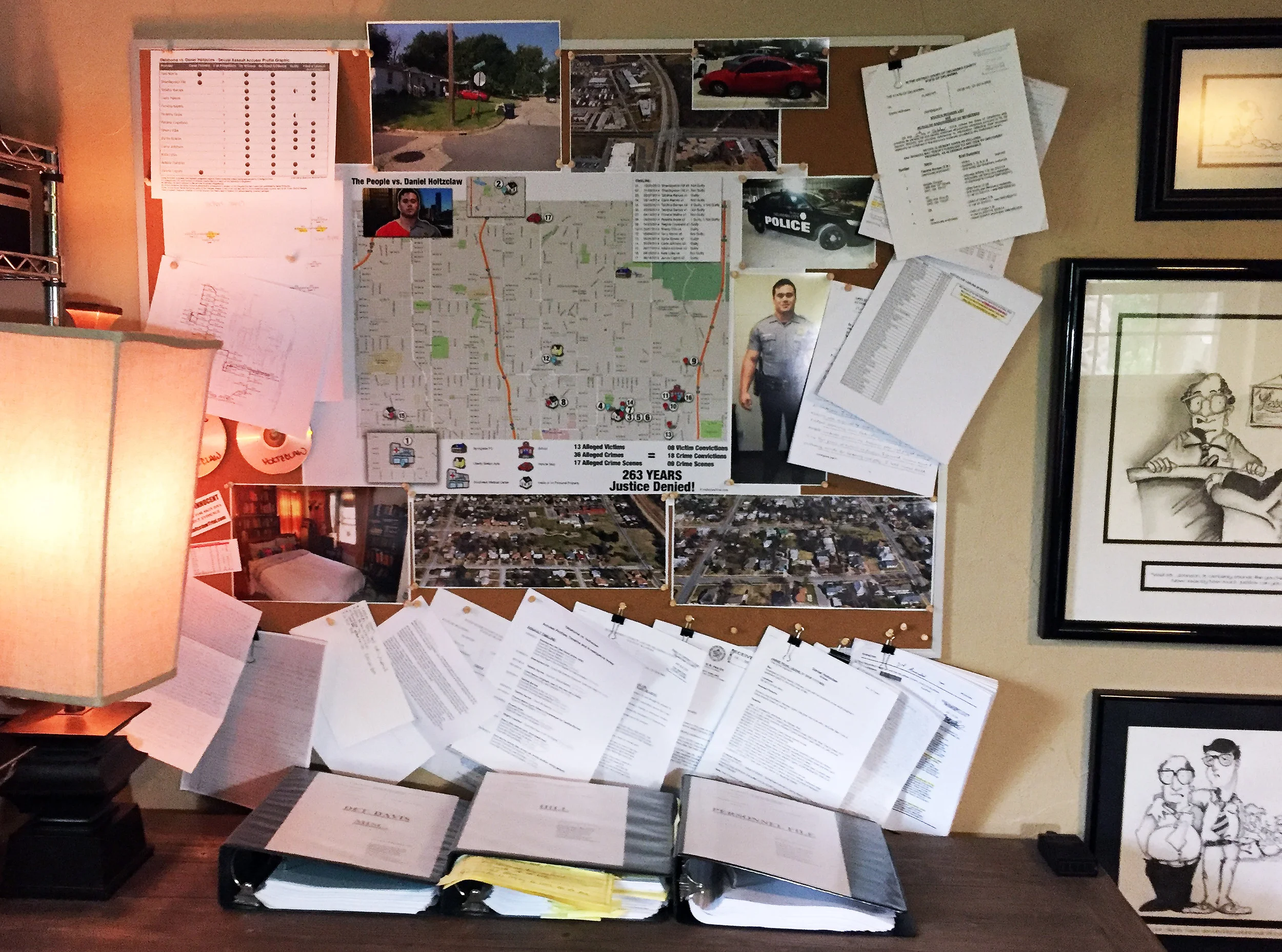The 'war wall' in defense investigator Brian Bates' office.