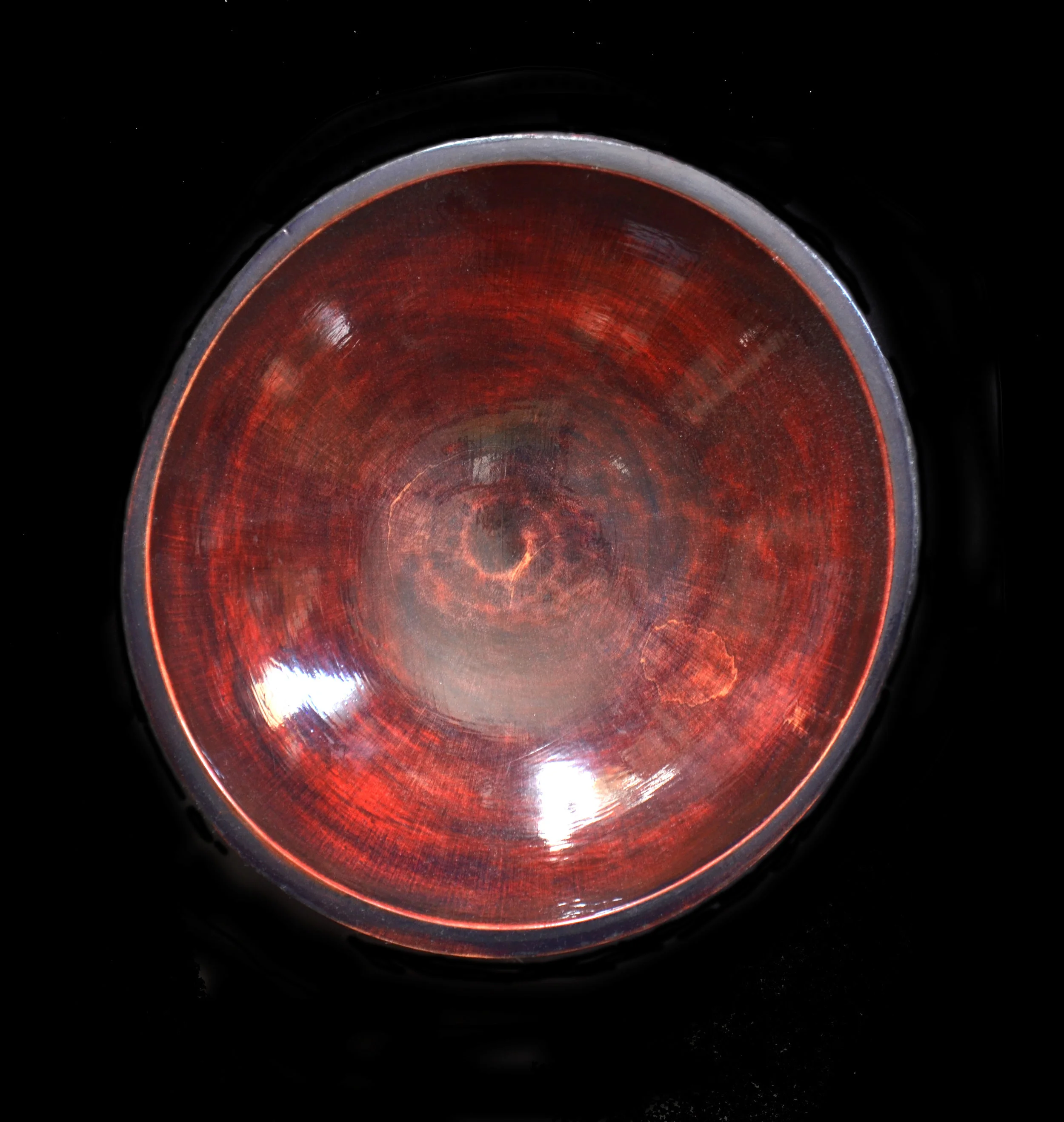 Top of small red bowl