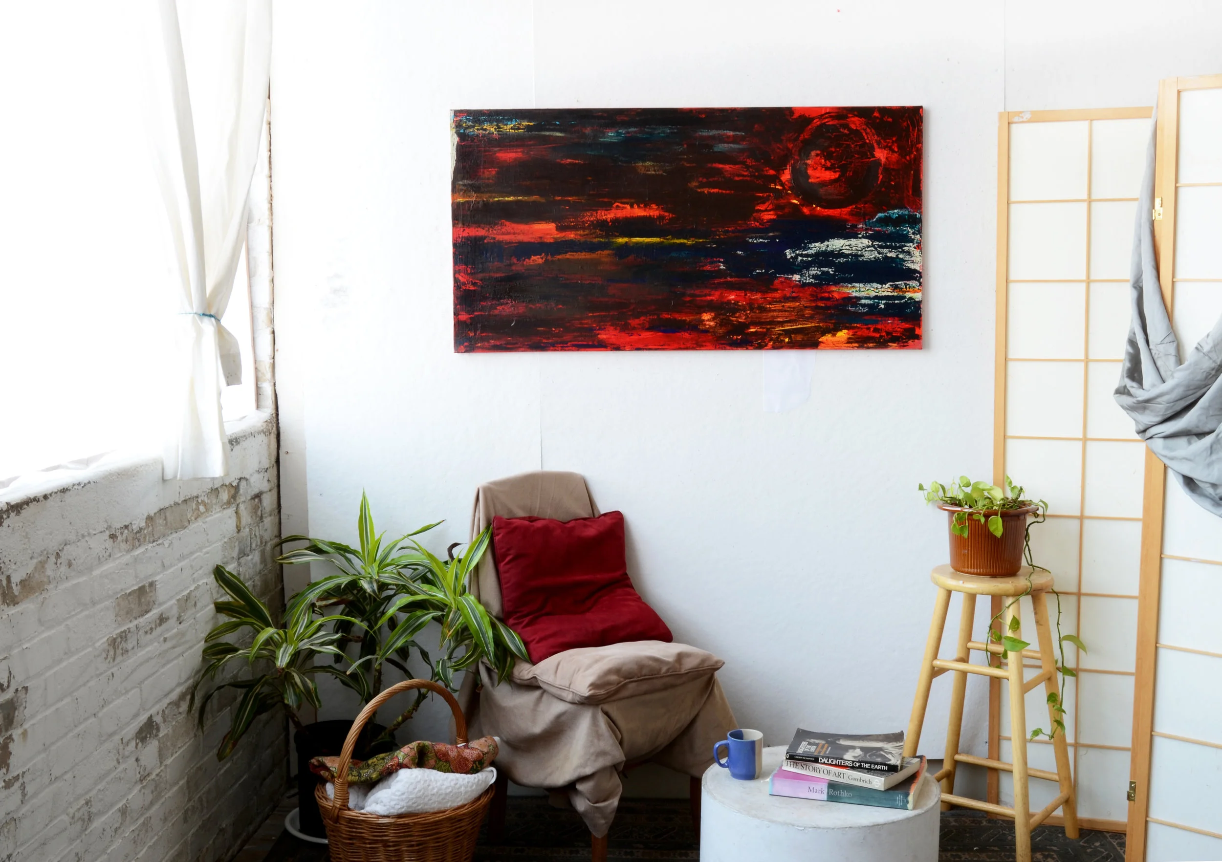 Dark moonrise on studio wall