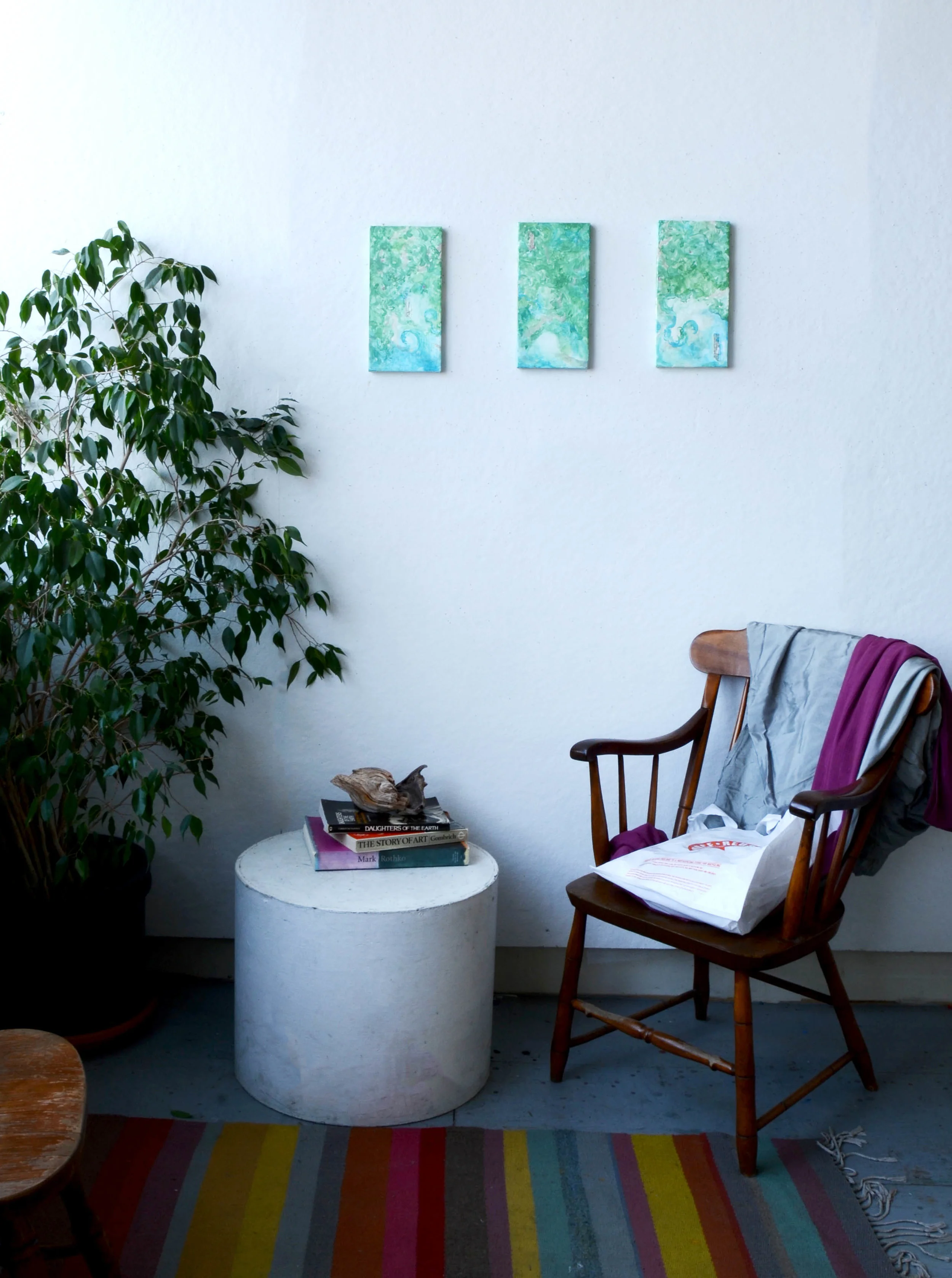 turquoise paintings on wall