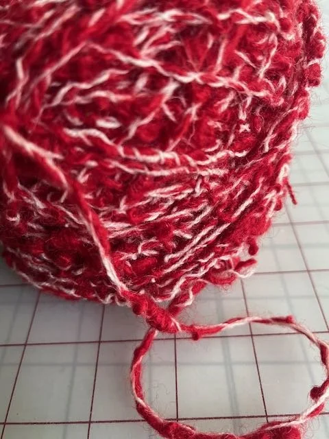 handspun red white boucle.jpeg