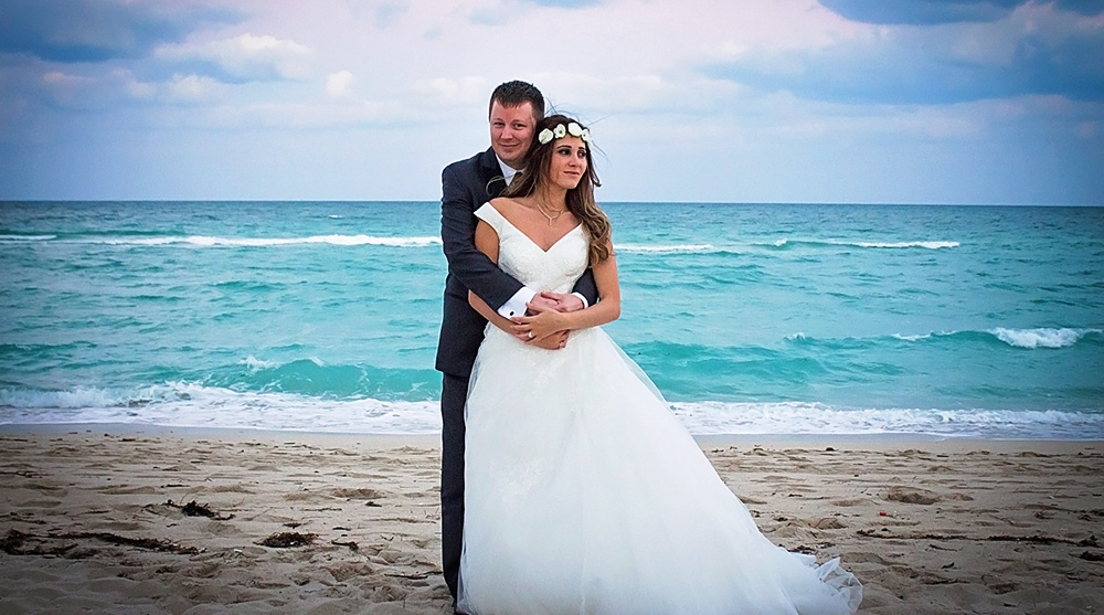 bride-groom-portraits-couple-beach-white-dress-wedding-photographer-los-angeles-southern-california-elopment-blue-sky-ocean-sandy.jpg