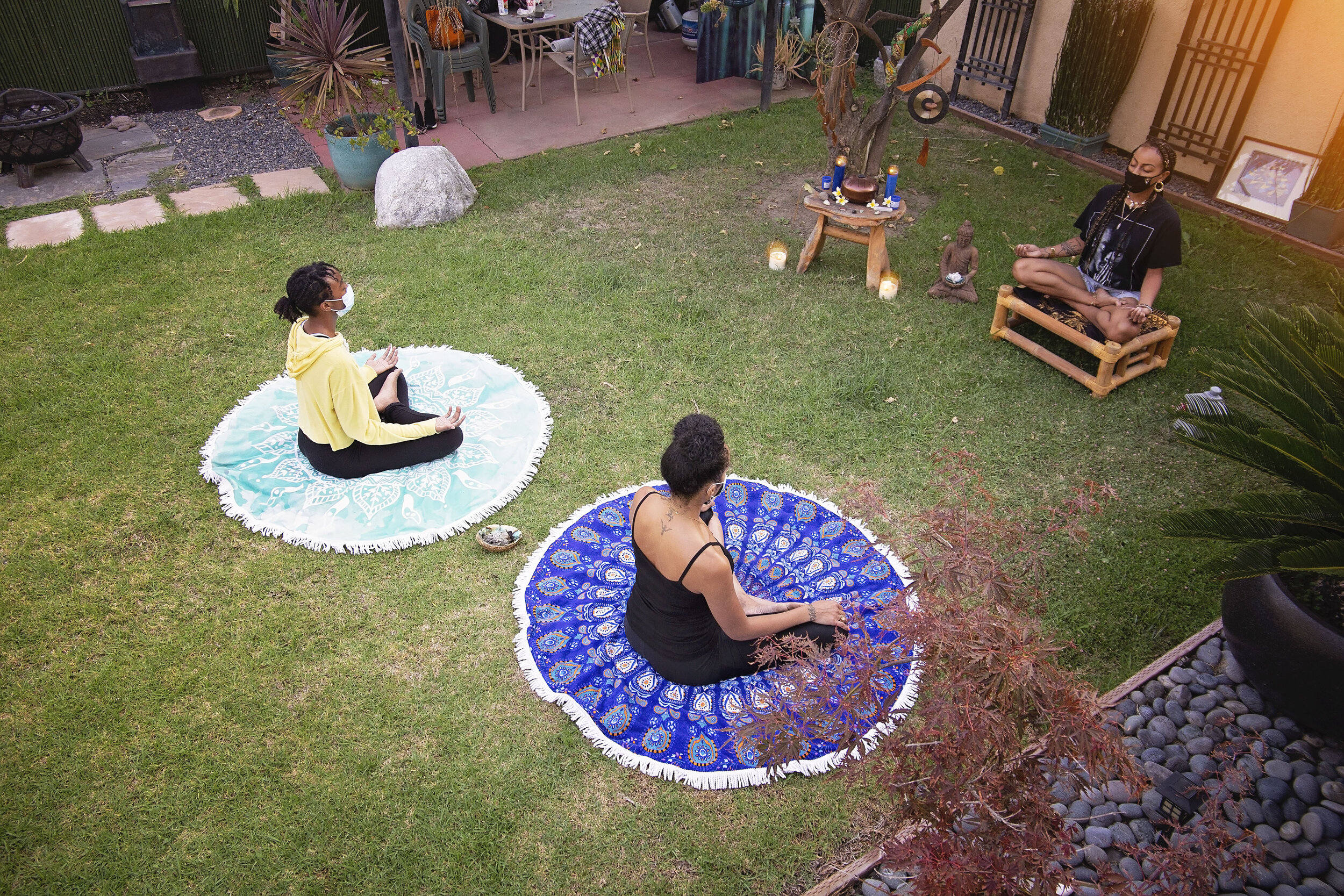 Ratchet-buddha-tiff-meditation-wellness-session-outdoors-los-angeles-south-central-mental-health-black-lives-matter-women-healing-self-love-mats-yoga-nature-trees-sunset-calming