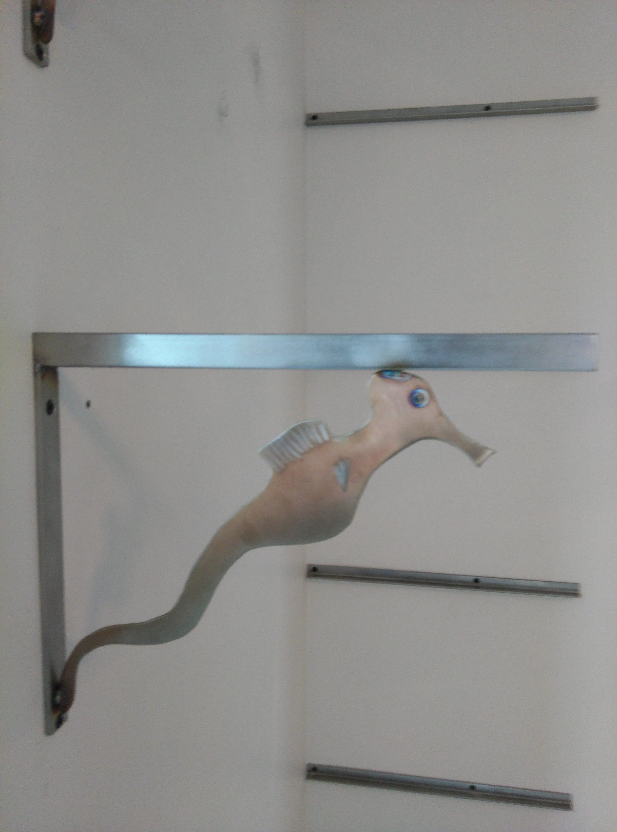 Seahorse shelf brackets