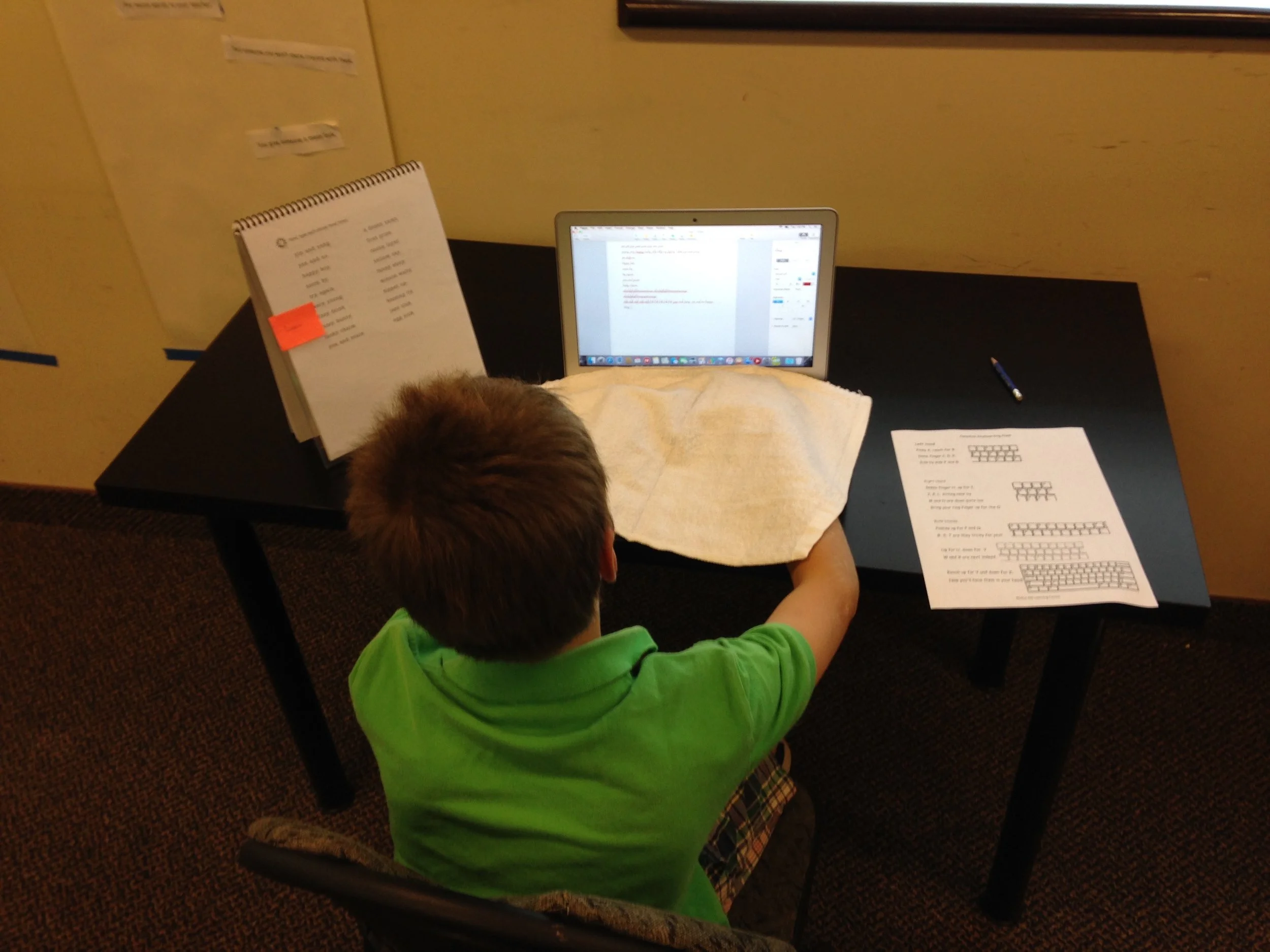One of our keyboarding students learning how to type with their hands covered.