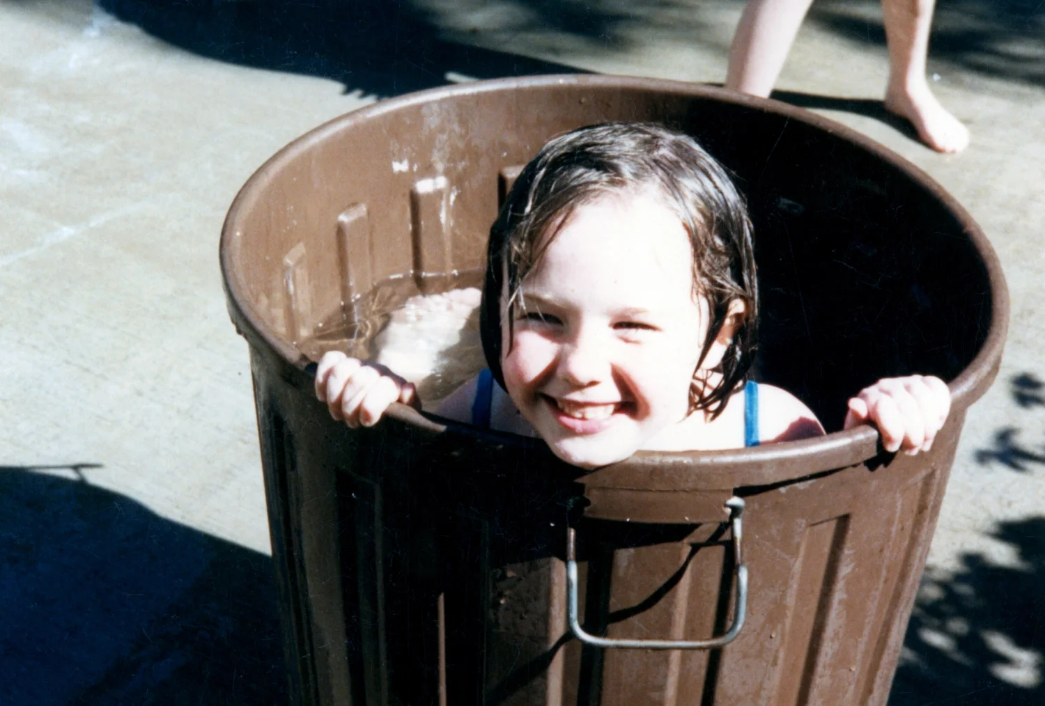 The look of a child who has yet to discover the horror of her newborn nephew's "belly button."