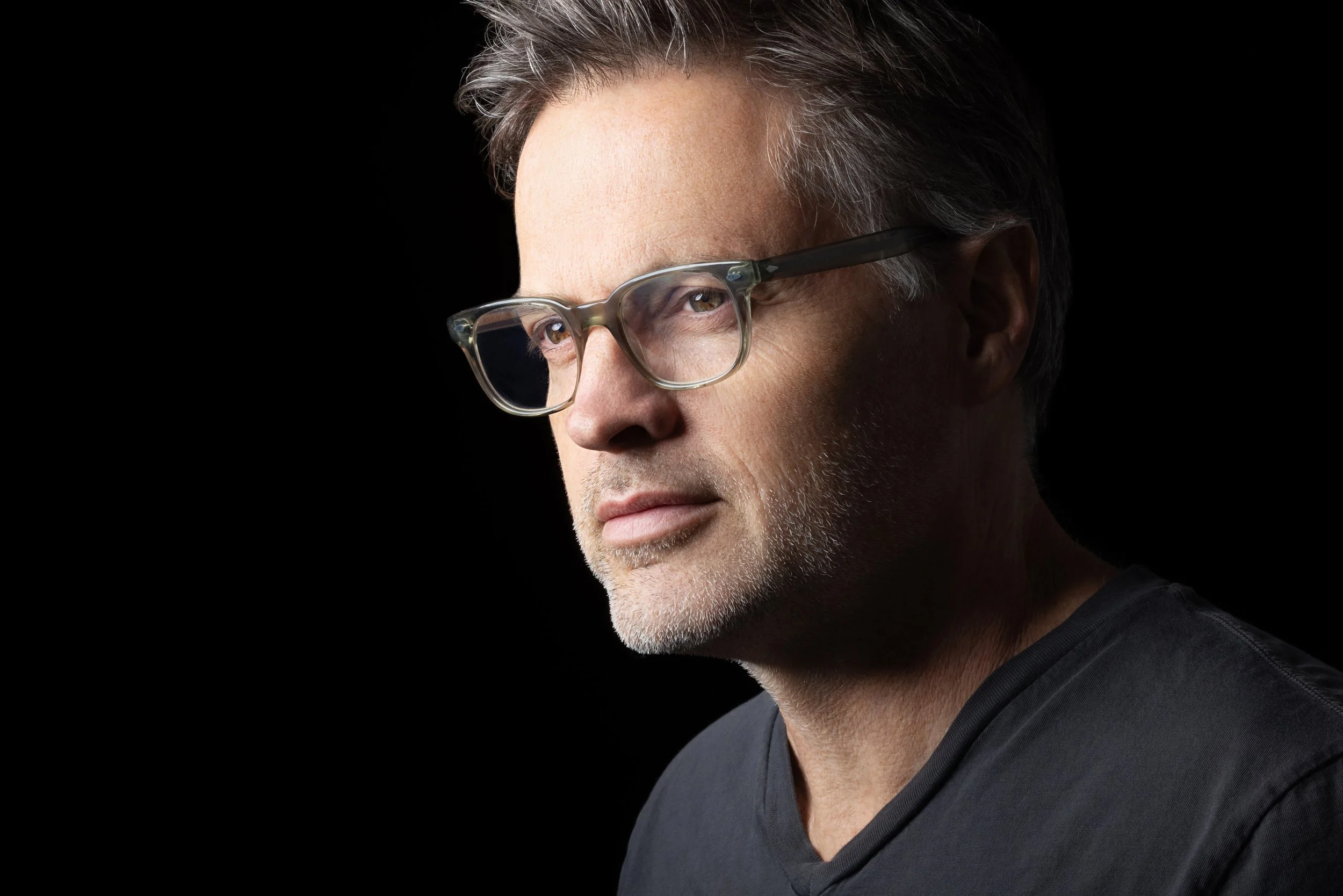 Close-up portrait of top Los Angeles acting coach Michael Woolson by Kenneth Dolin Photography, Los Angeles headshot photographer. 