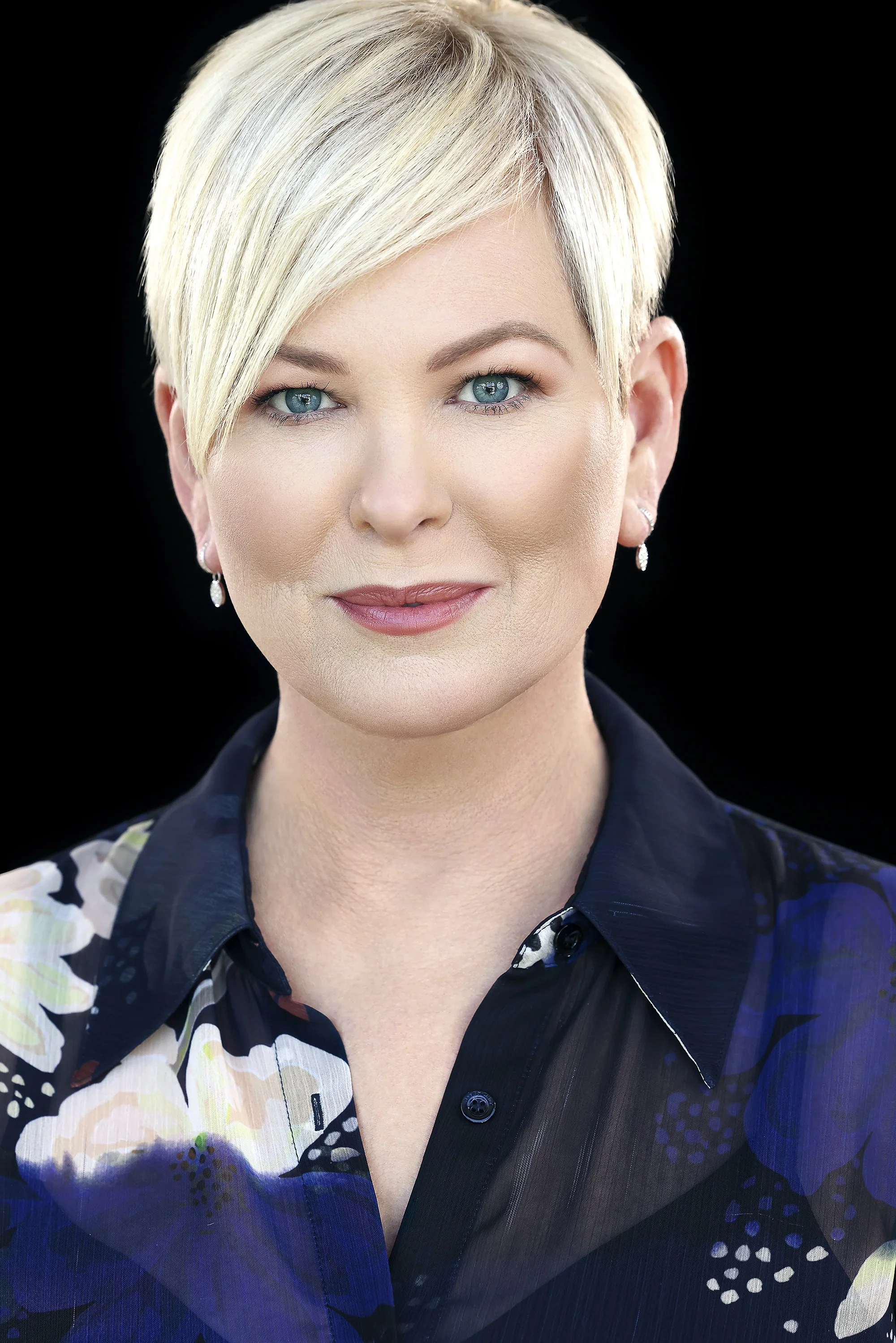 Dramatic business headshot by top Los Angeles corporate photographer Kendo Brown, specializing in brand-building headshots for professionals, realtor headshots, corporate headshots, team headshots and branding for executives in Los Angeles 90210, 902