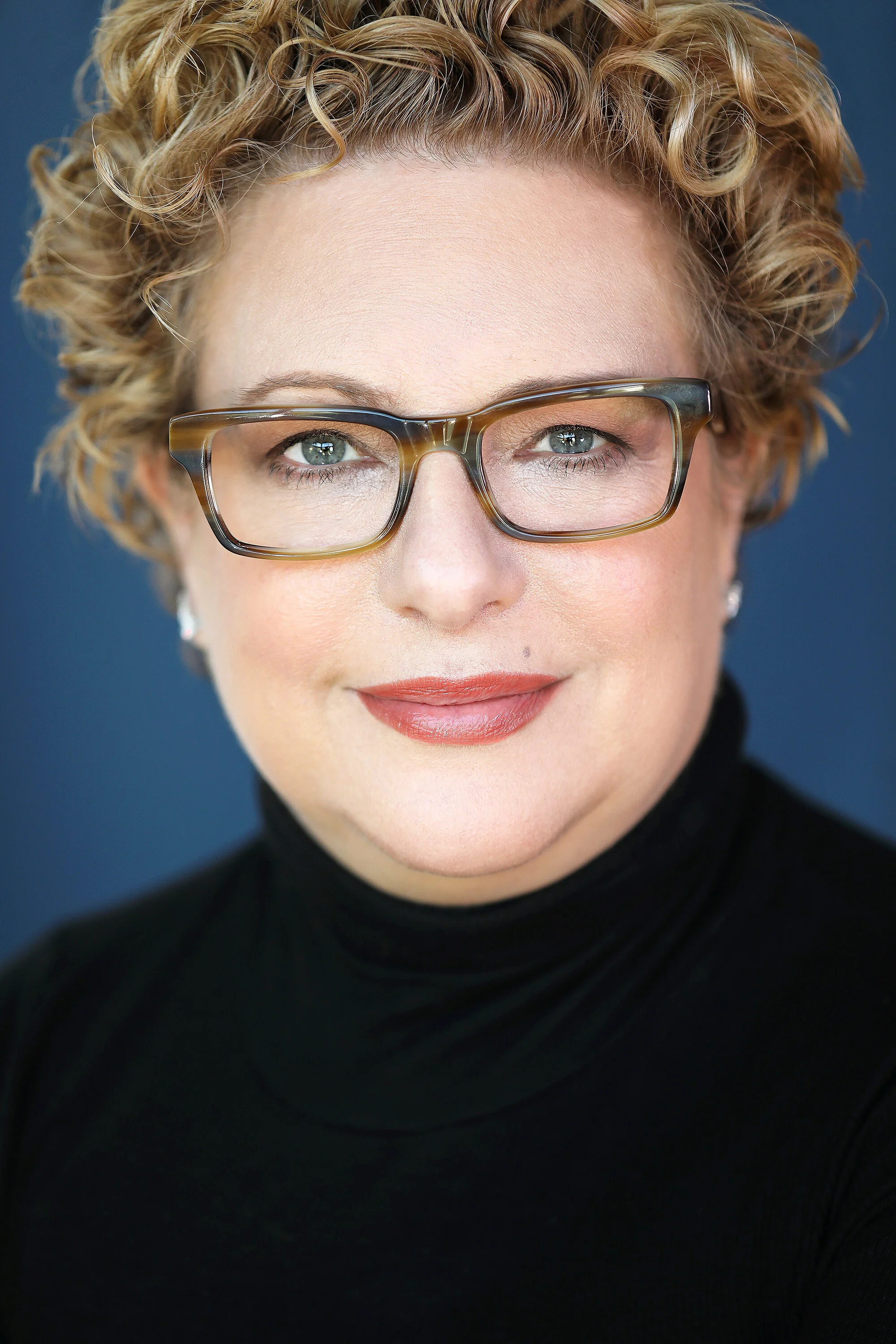 Dramatic business headshot by top Los Angeles corporate photographer Kendo Brown, specializing in brand-building headshots for professionals, realtor headshots, corporate headshots, team headshots and branding for executives in Los Angeles 90210, 902