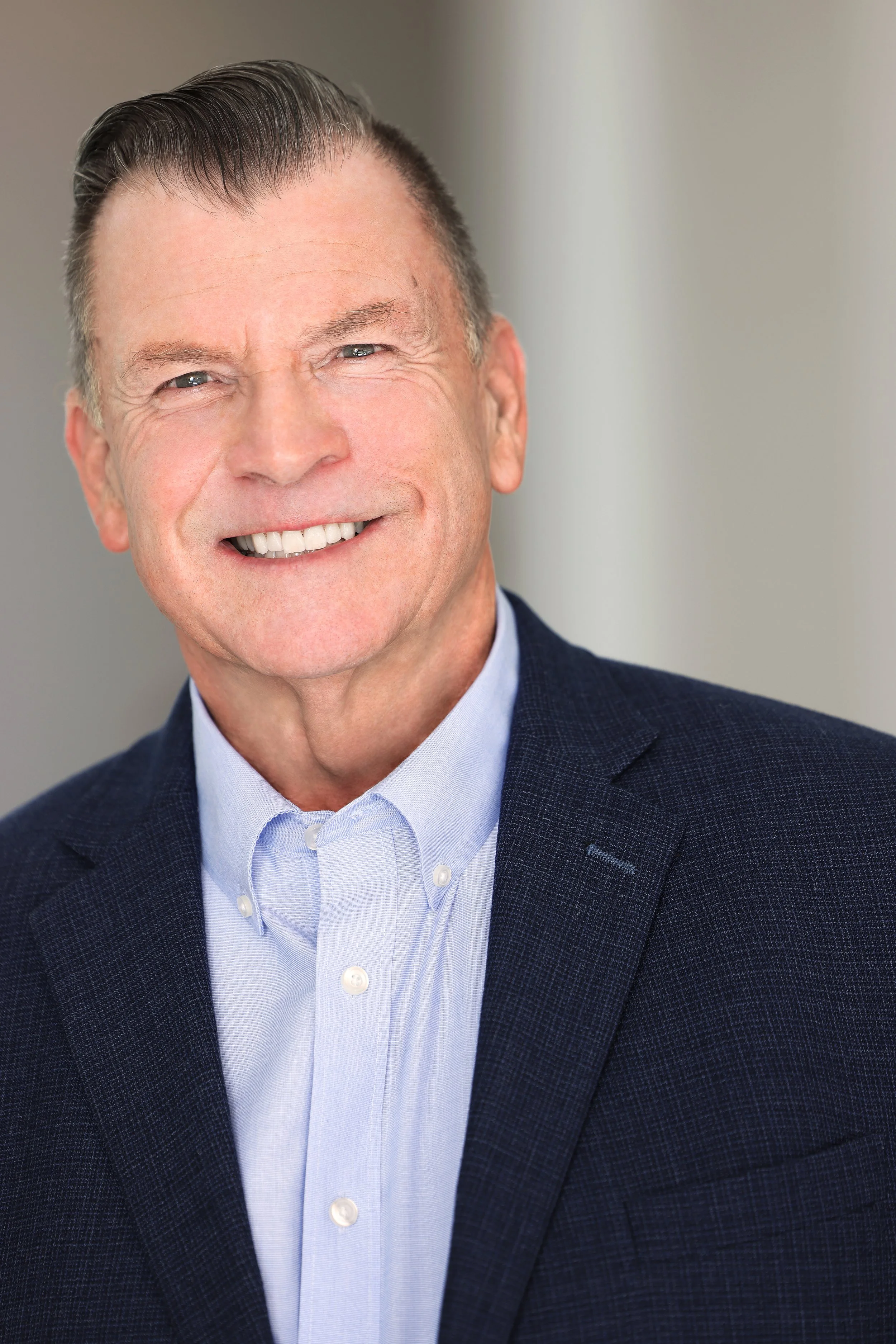 Lifestyle photo of a luxury realtor by Kenneth Dolin, LA's top executive photo studio, creating one-of-a-kind luxury real estate photography and video for clients in Los Angeles, Beverly Hills and more. Branding-photography for top producing Luxury r