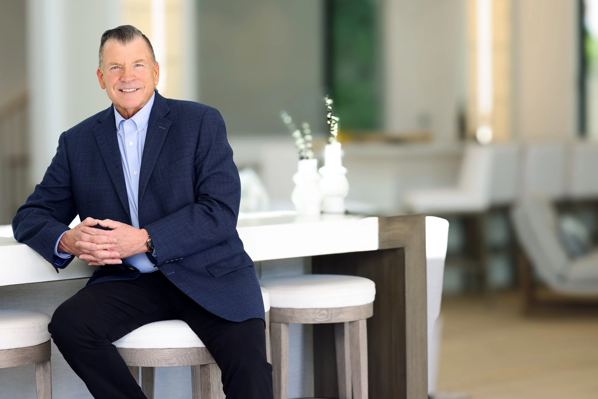 Lifestyle photo of a luxury realtor by Kenneth Dolin, LA's top executive photo studio, creating one-of-a-kind luxury real estate photography and video for clients in Los Angeles, Beverly Hills and more. Branding-photography for top producing Luxury r