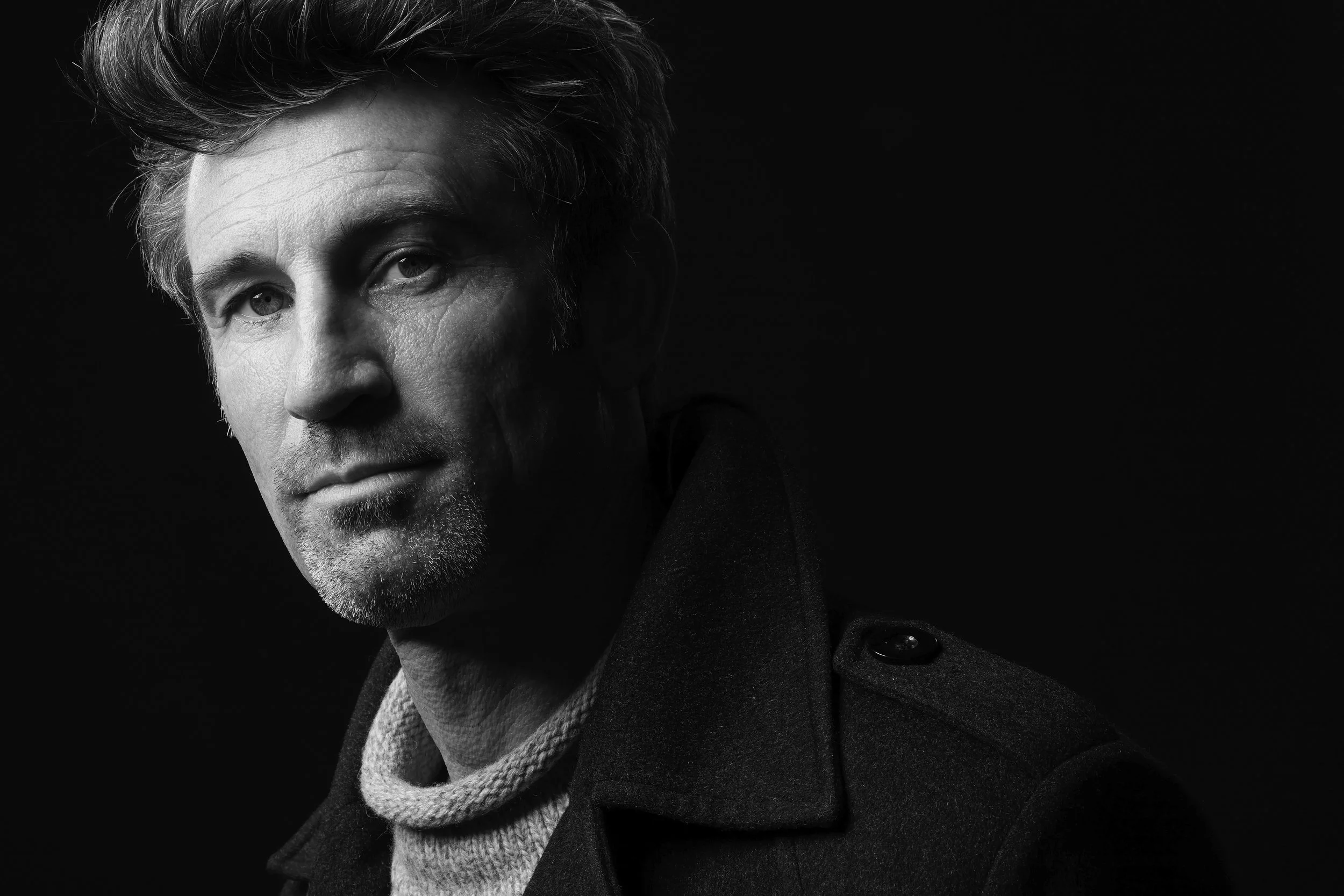 Dramatic theatrical headshot by Kenneth Dolin Photography in Los Angeles specializes in acting headshots, modeling portfolio photography, celebrity headshots, and actor portraits for the top talent agencies, best modeling agencies and top talent mana