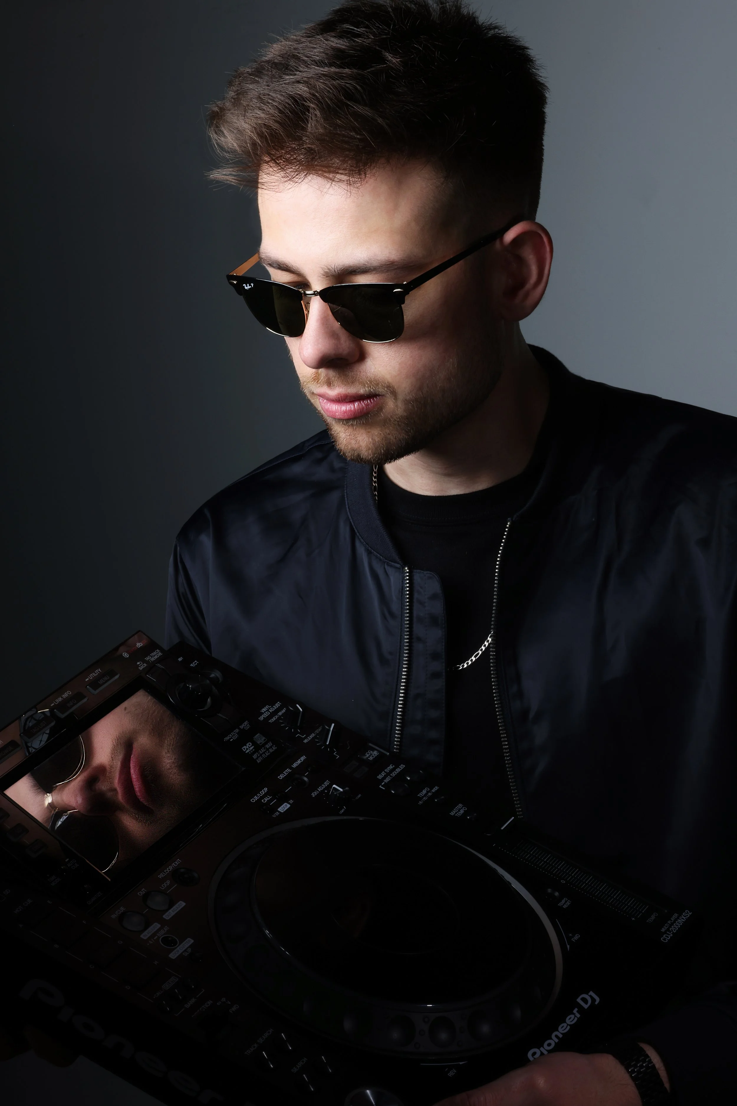 Portrait of a DJ by top Los Angeles photographer Kendo Brown, specializing in brand-building headshots for professionals, artists, technologists and media professionals. Beverly Hills headshots, Brentwood headshots, headshots in Malibu. Luxury execut