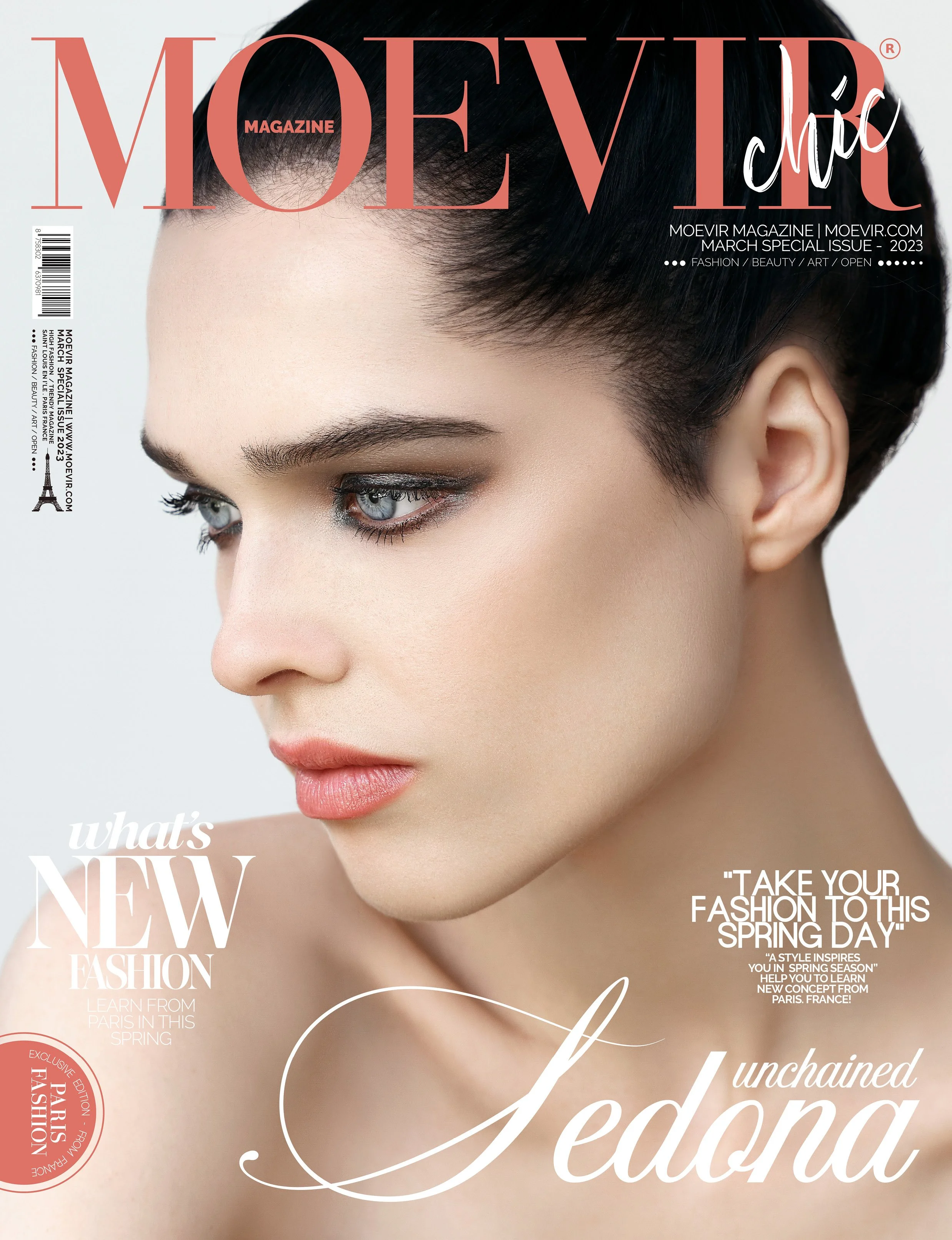 Close-up of a young woman with short black hair, fair skin, and blue eyes on the cover of Moevr chic magazine. She has subtle makeup with a focus on her eyes and lips.