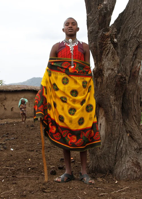 Young Maasai within his home enclosure