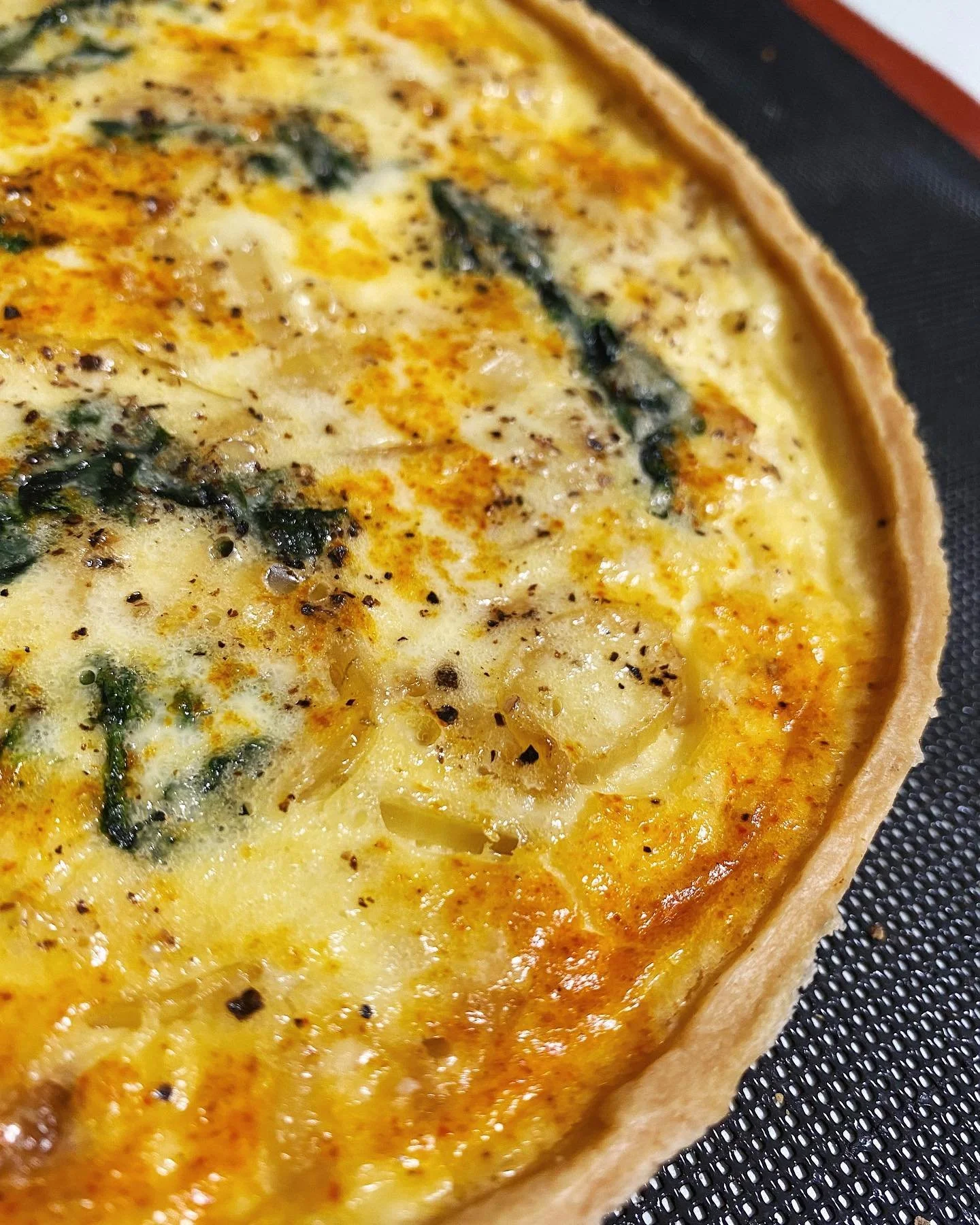Spinach and Onion Quiche // A simple quiche served with a side of spinach dressed in a vinaigrette. #mrAdamJeffery
.
.
.
.
.
#pastry #pastrychef #chefpatissier #quiche #savouryfood #chef #chelife #foodporn #foodie