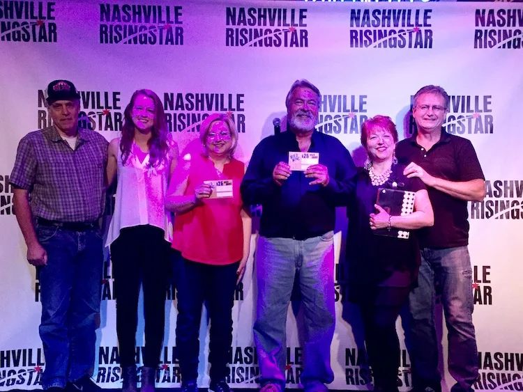 From left to right, David Reuter (music industry judge), Kristen Parisi (music industry judge), Mary Ellen Hayes (audience winner), Uncle Larry Saffer (music industry judges winner), Sue Mohr (emcee), Keith Mohr (NRS creator/director)