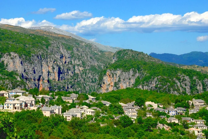 Monodenri Monodendri is one of the most beautiful villages of Zagori, built 1060 metres above the sea level, 39 km from Ioannina. It was named after a very big fir-tree which was situated there until 1840. Until 1753 it was a settlement which consisted of three quarters (Vitsa, Ano Mahalas, Agios Georgios). Nowadays, Monodendri is an attraction pole for all the visitors from Greece or abroad the whole year round.