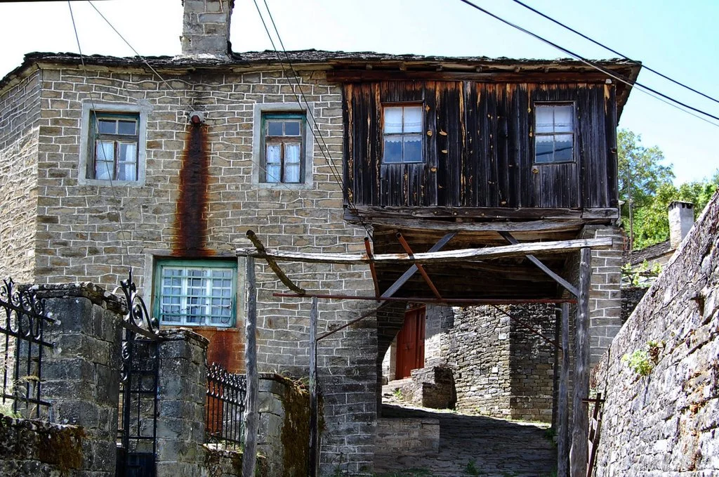 Negades A traditional village of Zagori (altitude 1,060 m). The triple-naved basilica of Ag. Georgios was founded in 1792. It is located 44.5 km N of Ioannina.