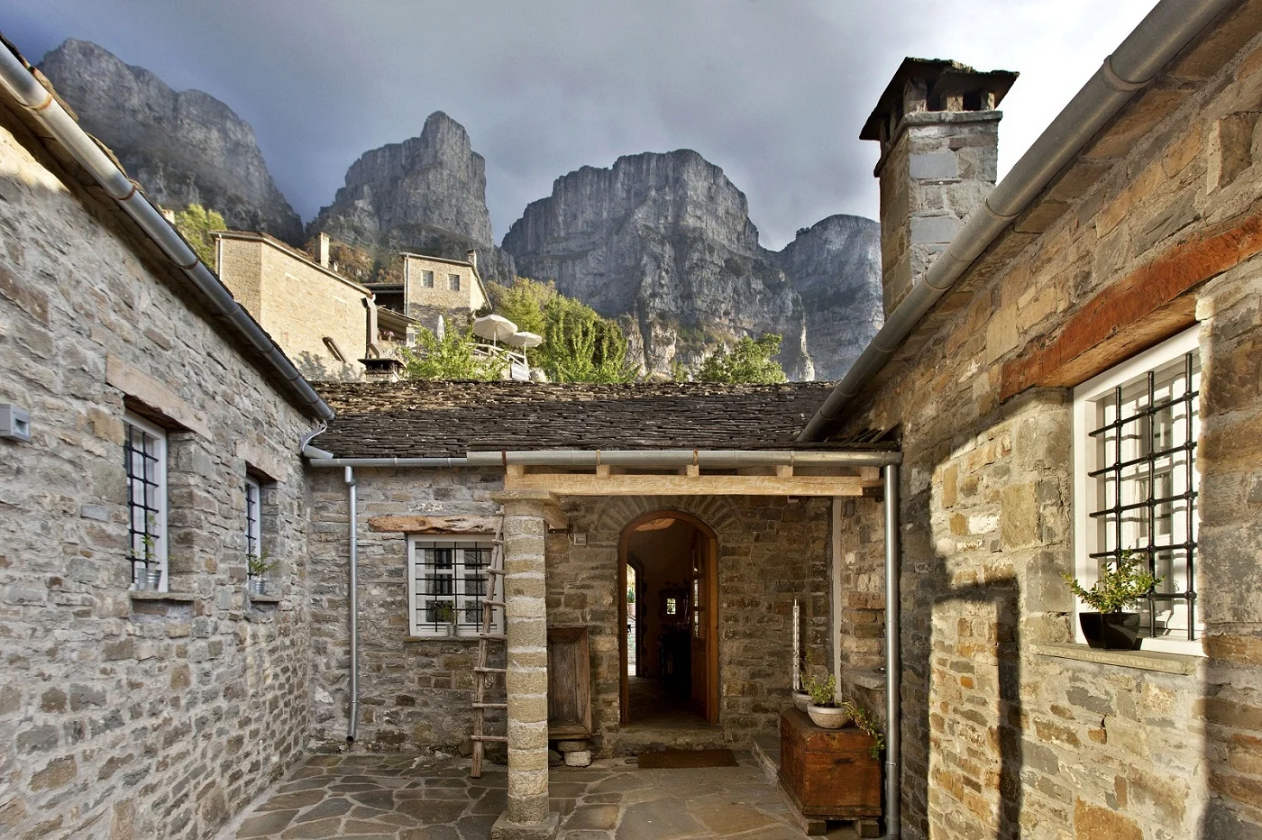 Within the Vikos Gorge, this cosmopolitan hotel is 36 km from Drakolimni Lake and 39 km from the natural phenomena of the Stone Forest. Laid-back, fashionable rooms with wood furnishings feature minibars, flat-screen TVs, free Wi-Fi and rainfall showers. Upgraded rooms offer fireplaces or balconies, while suites add Jacuzzis. Room service is available. Complimentary breakfast is served in a refined restaurant with views of the Gorge. There's also a posh spa with an indoor pool, a steam room and a sauna.