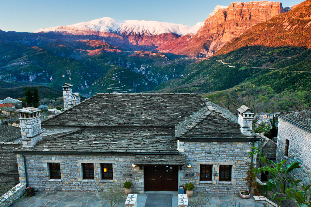 In the Pindus mountains, this rustic-chic, stone-built resort is 5 km from Moni Panagias church and 13 km from Vikos Gorge.   Modern rooms and suites, with stone and wood accents, feature minibars, free Wi-Fi and flat-screen TVs, as well as lounge a…