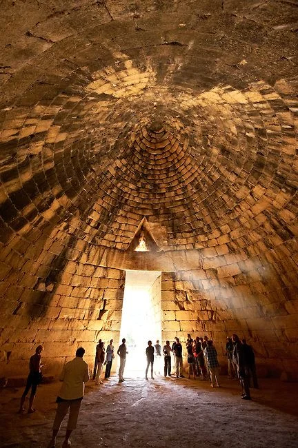 The Treasury of Atreus or Tomb of Agamemnon is a large tholos or beehive tomb on Panagitsa Hill at Mycenae, Greece, constructed during the Bronze Age around 1250 BC.