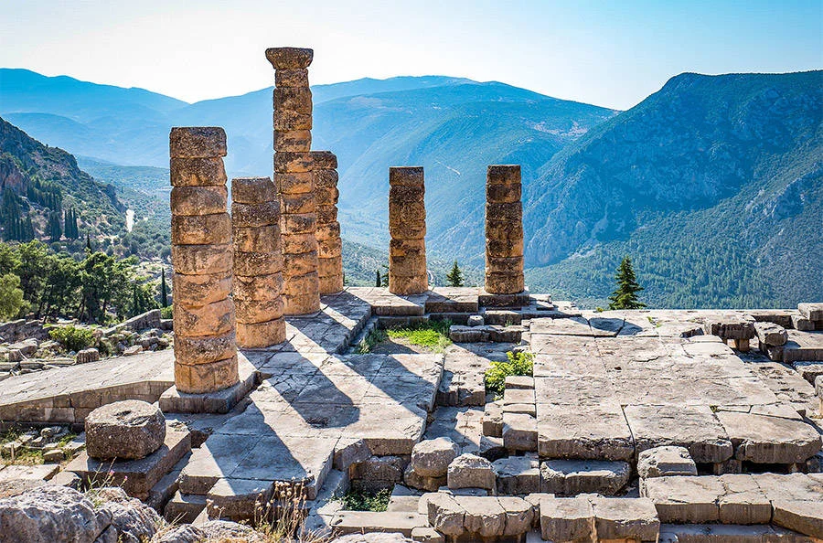 Wikimedia CommonsRuins of the ancient Temple of Apollo at Delphi, overlooking the valley of Phocis.