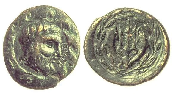 Fig. 2 .Bronze coin of Classical Helike: obverse shows the head of Poseidon and inscription ELIK, reverse shows a trident flanked by dolphins. (Staatliche Museen zu Berlin)
