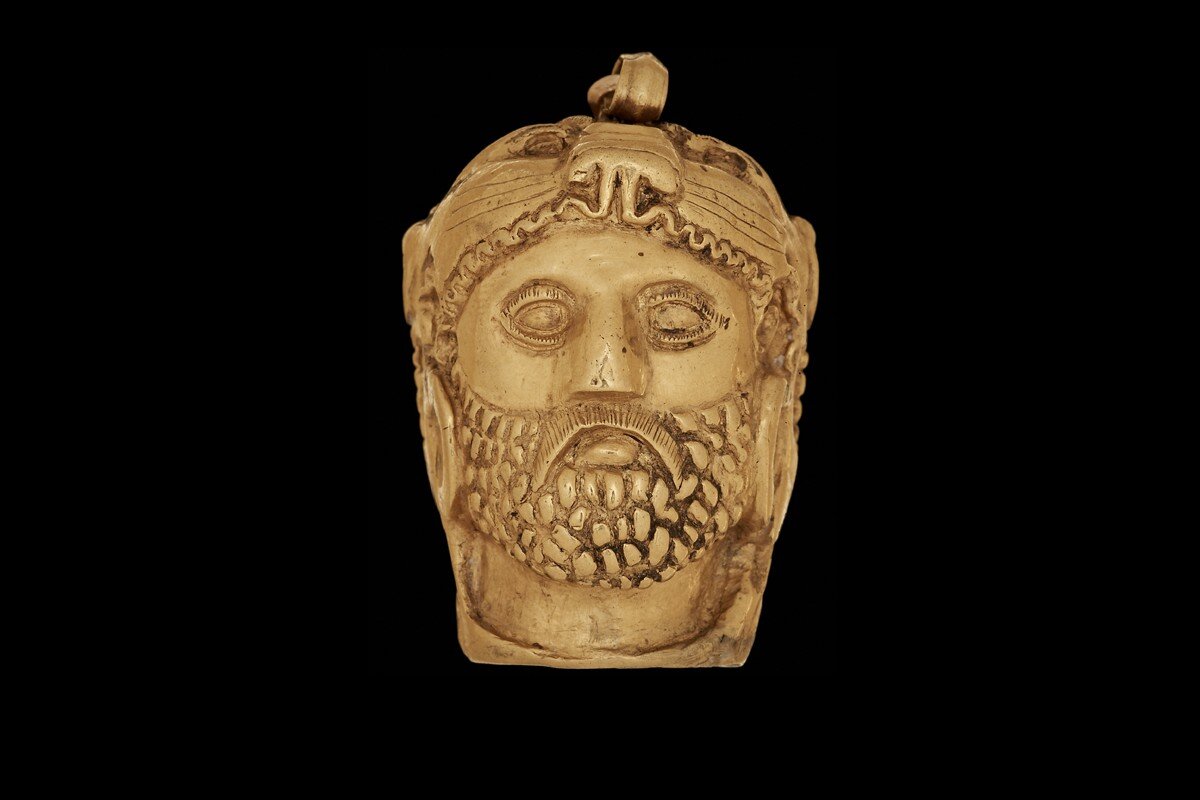   GOLD ORNAMENT IN THE SHAPE OF A BUST OF HERCULES, DERVENI, TOMB Ζ’, LATE 4th - EARLY 3rd c. BC  