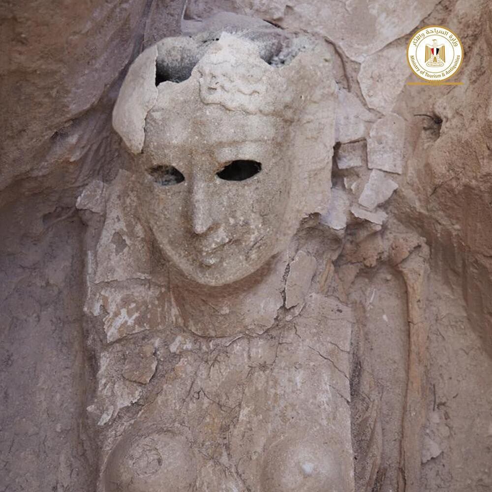  Among the other burials at the site, archaeologists discovered this female mummy who has a death mask that covers much of her body. (Image credit: Egyptian antiquities ministry) 