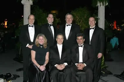 Misha & Shawn with the Messina brothersat the Grand Ball at Lamar University honoring Frank Messina (center)