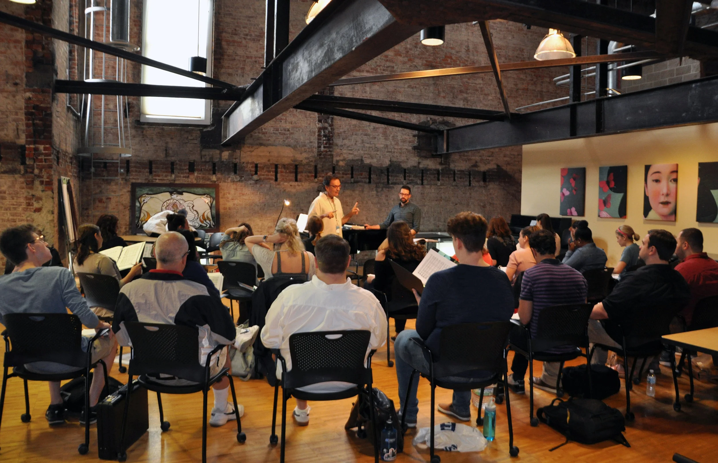 Chorus Master Henri Venanzi leads the chorus rehearsal for La Traviata