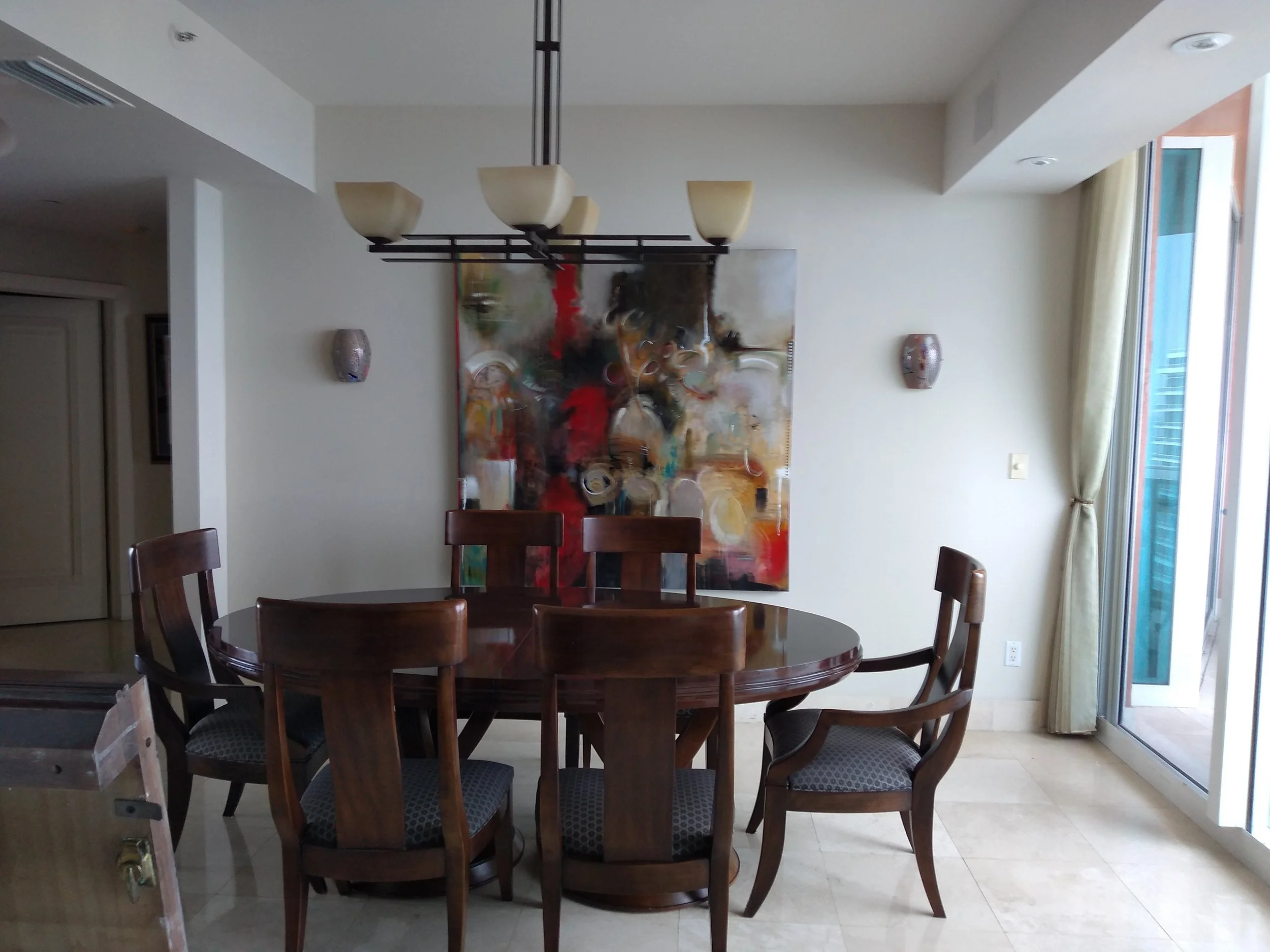 Dining room before remodel in South of Fifth Miami Beach penthouse