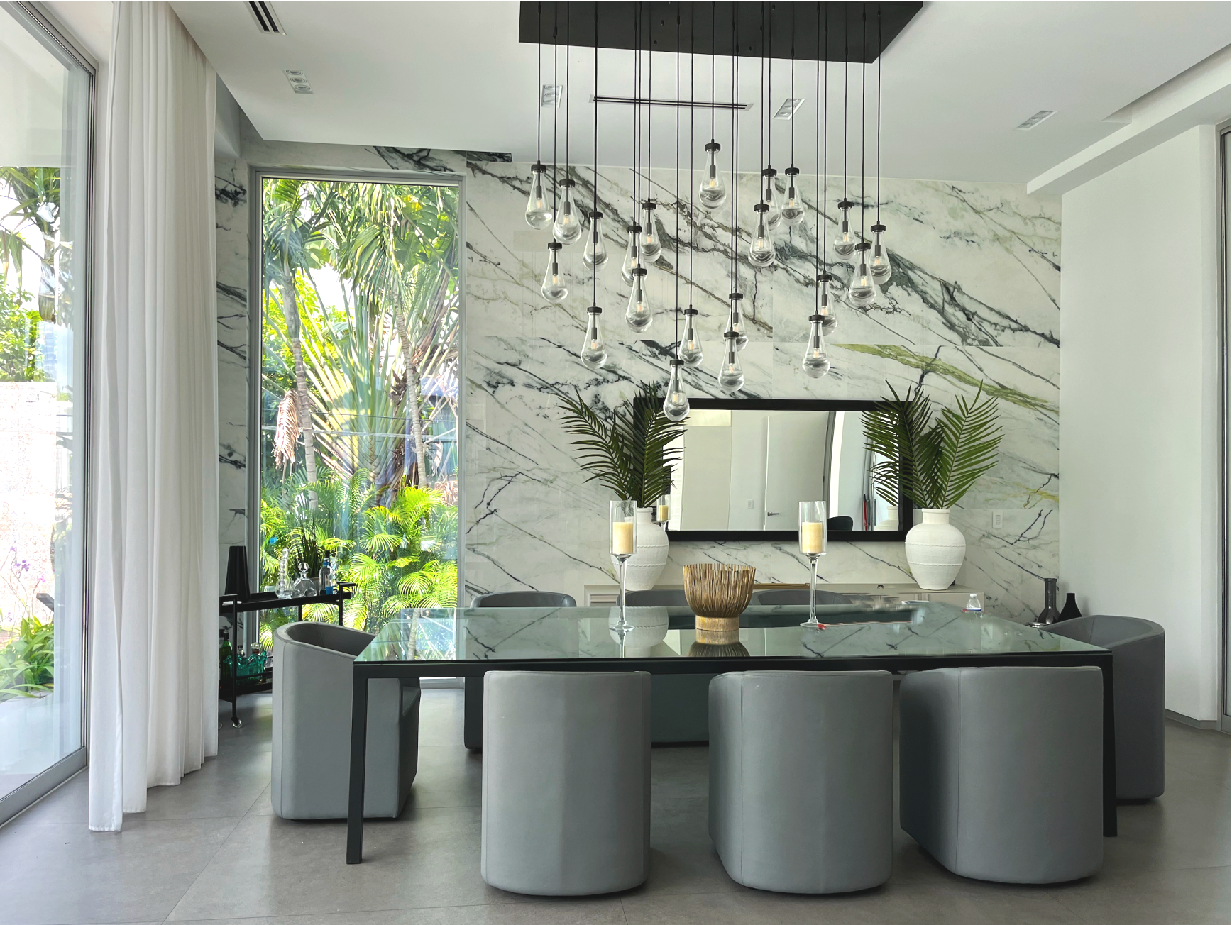 Green Calacatta porcelain slab feature wall dining room Hibiscus Island Miami Beach luxury interior design