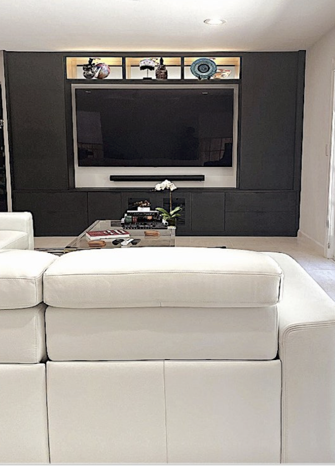 Multi-Functional Custom Media Cabinet with Surrounding Gallery, Sliding Doors to hide an 85" TV and base cabinetTV