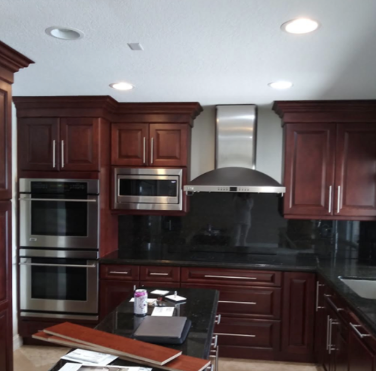 Dark mahogany kitchen before remodel in North Miami ranch home