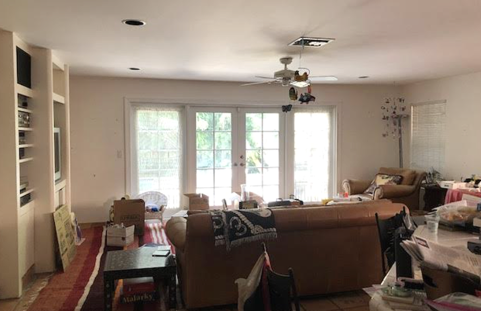 Family room before renovation in Coconut Grove Miami home with closed layout and dated finishes