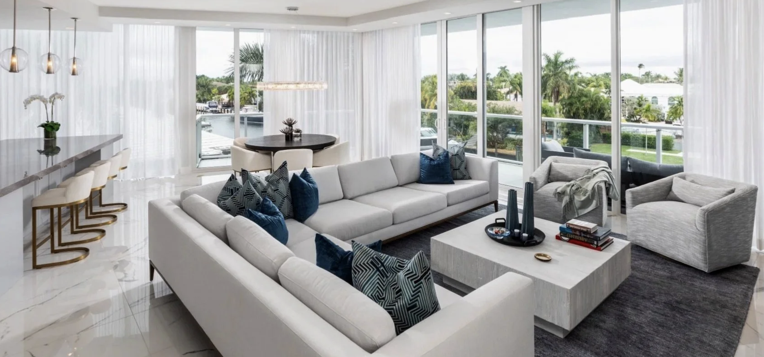 coastal contemporary living room design in a fort. lauderdale penthouse remodel by Exclusively To Design