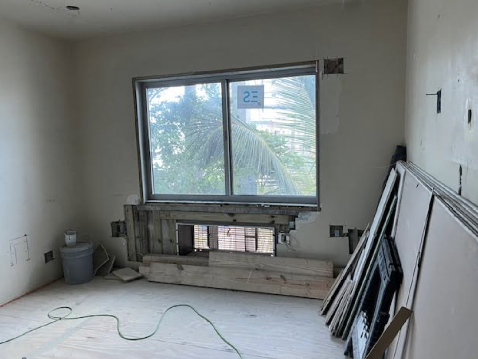 before photo of ensuite bedroom in historic miami beach condominium during investment property renovation prior to organic coastal interior design