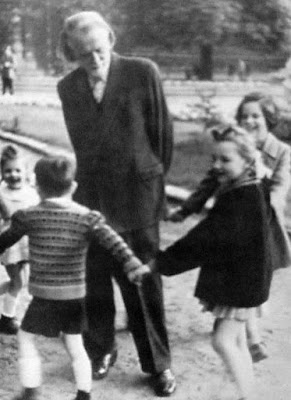 (Zoltán Kodály, playing with his children)