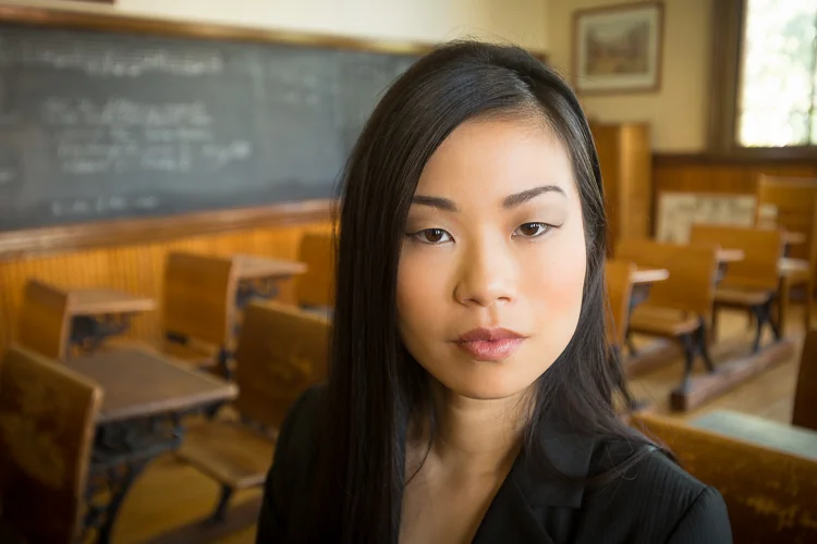 A little wider than a normal lens, creating some facial distortion Photo from "Digital Photo Mentor"