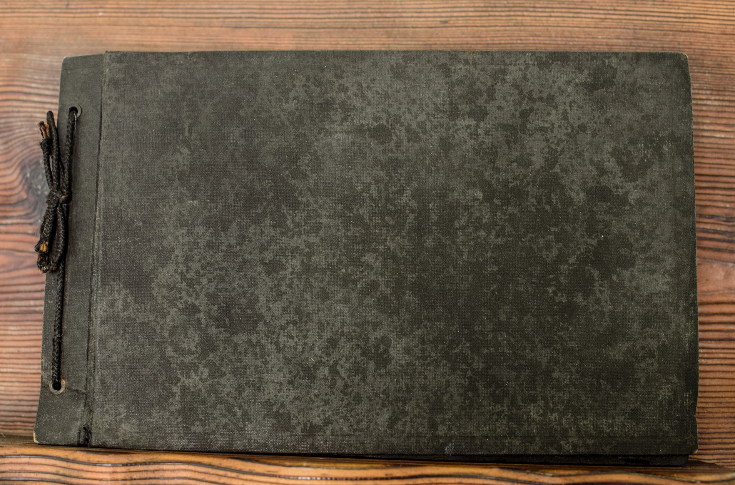  This is my Great Aunt Gwen's scrapbook circa the early 1900s. Though worn and fragile, I've preserved its contents by digitizing each page and photo.&nbsp; 