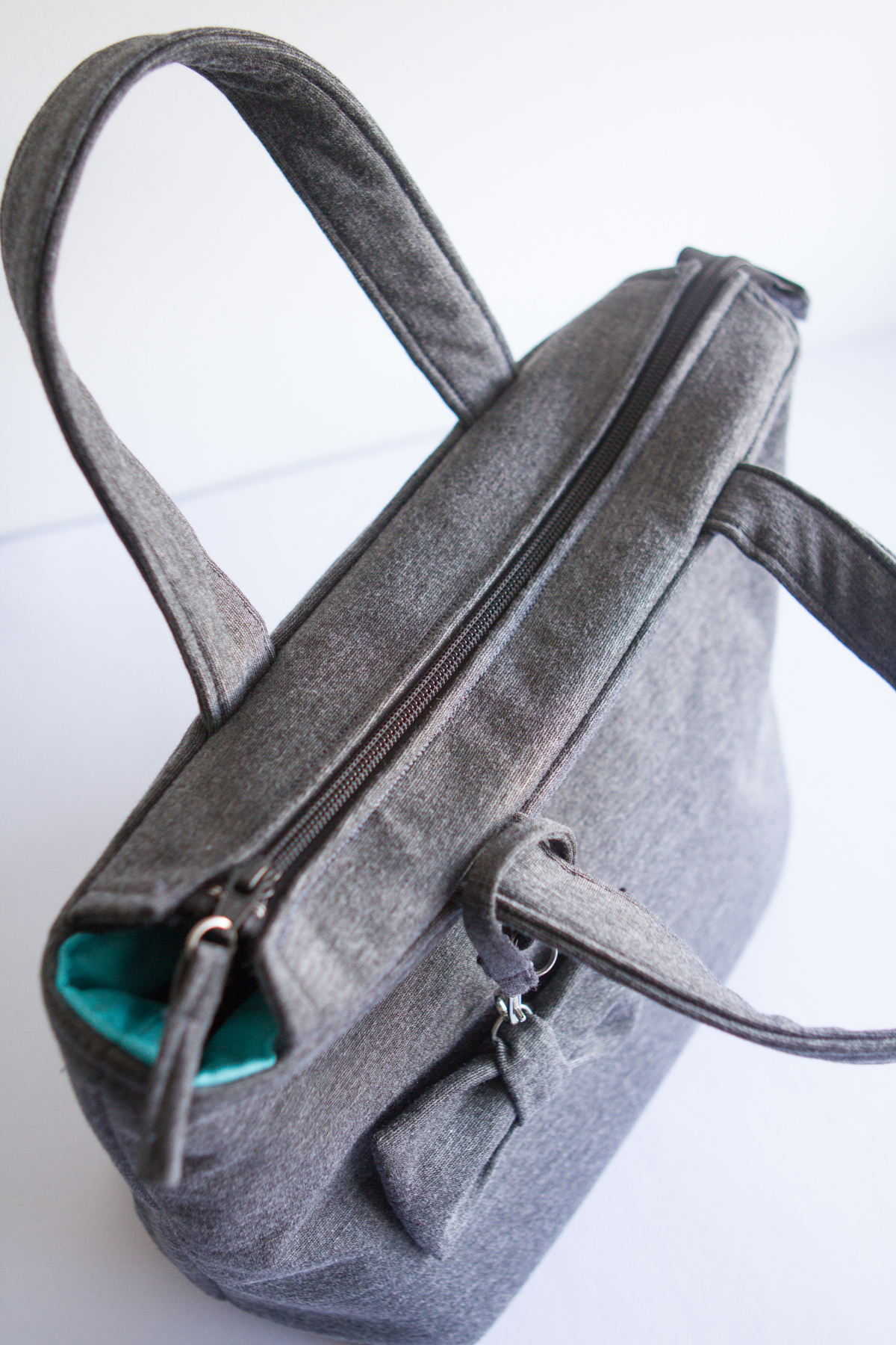 Zip closure (It looks like the fabric around the zip is stained but it's just the lighting.)