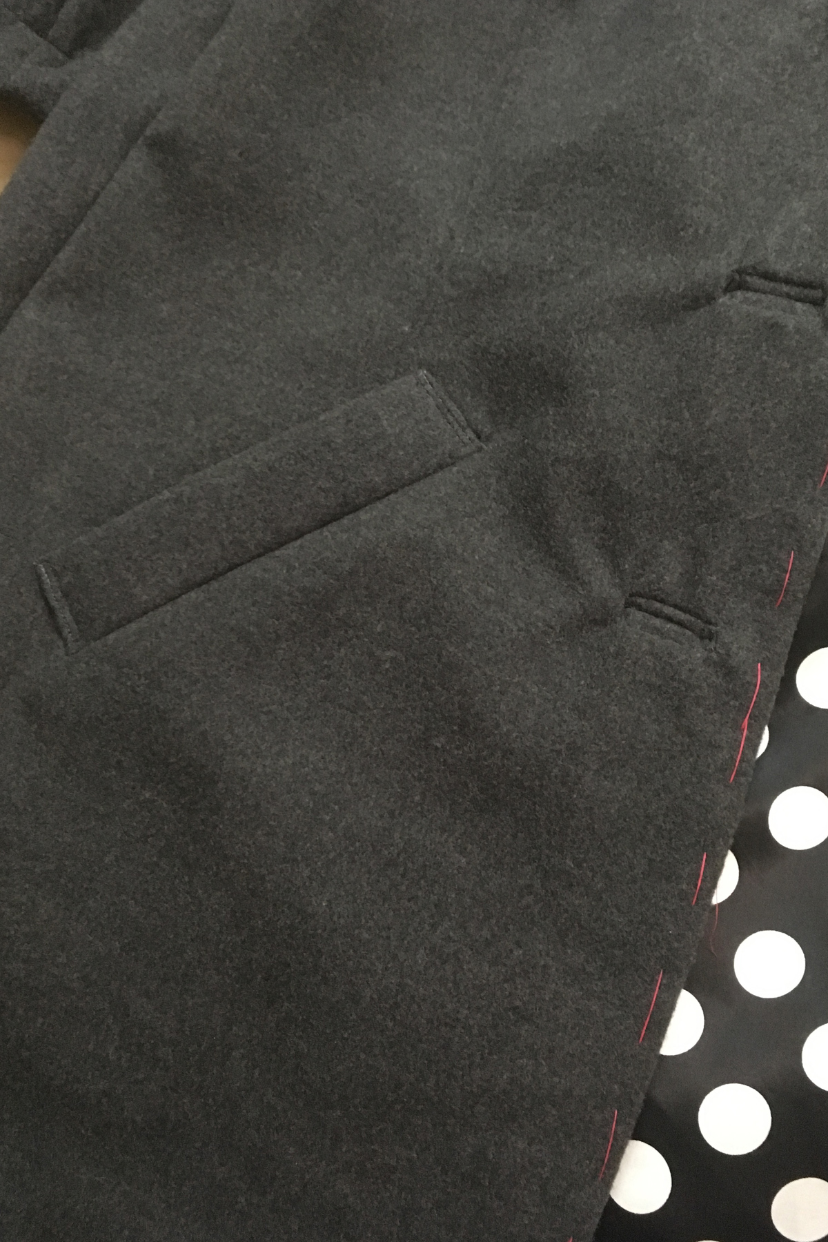 Welt pocket and bound buttonholes