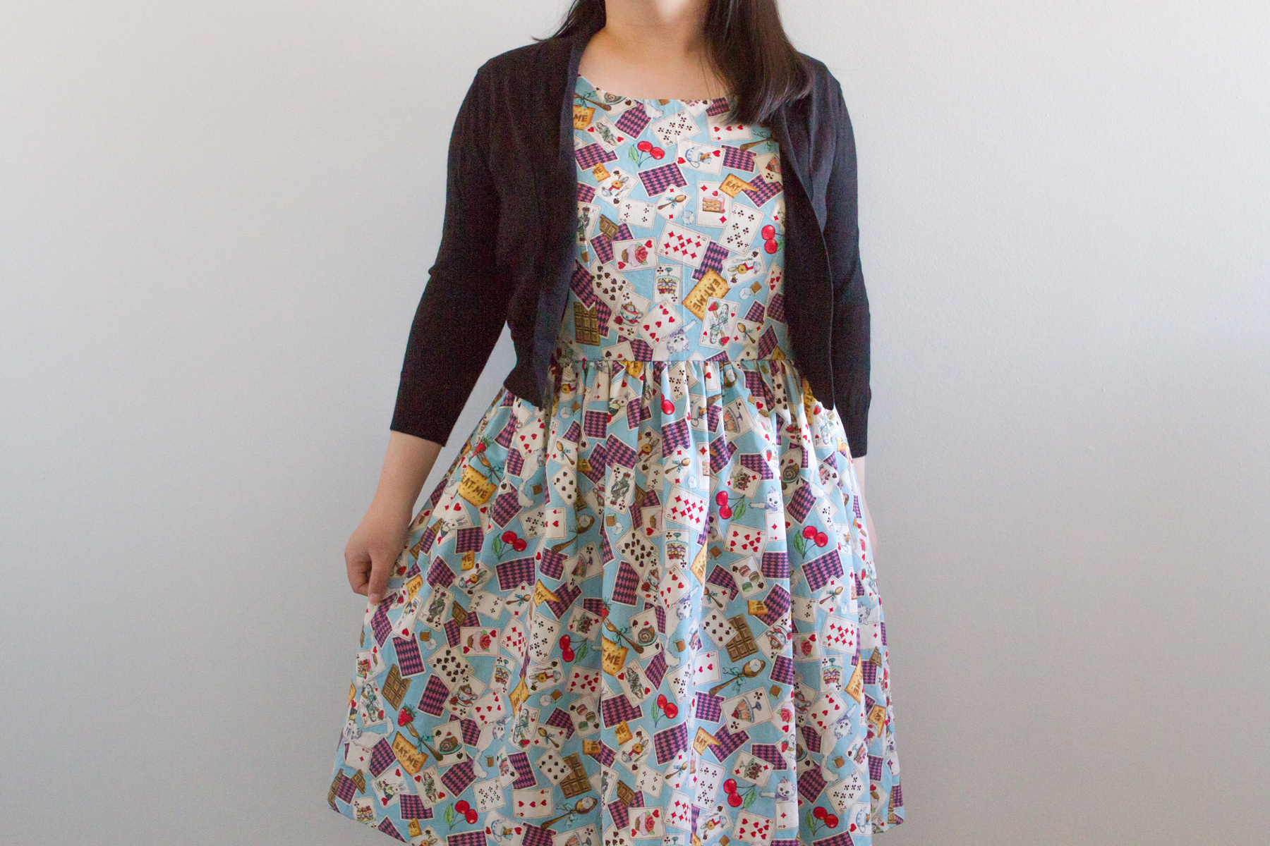 I think a beige cardigan would go better with this dress, I need to get one!
