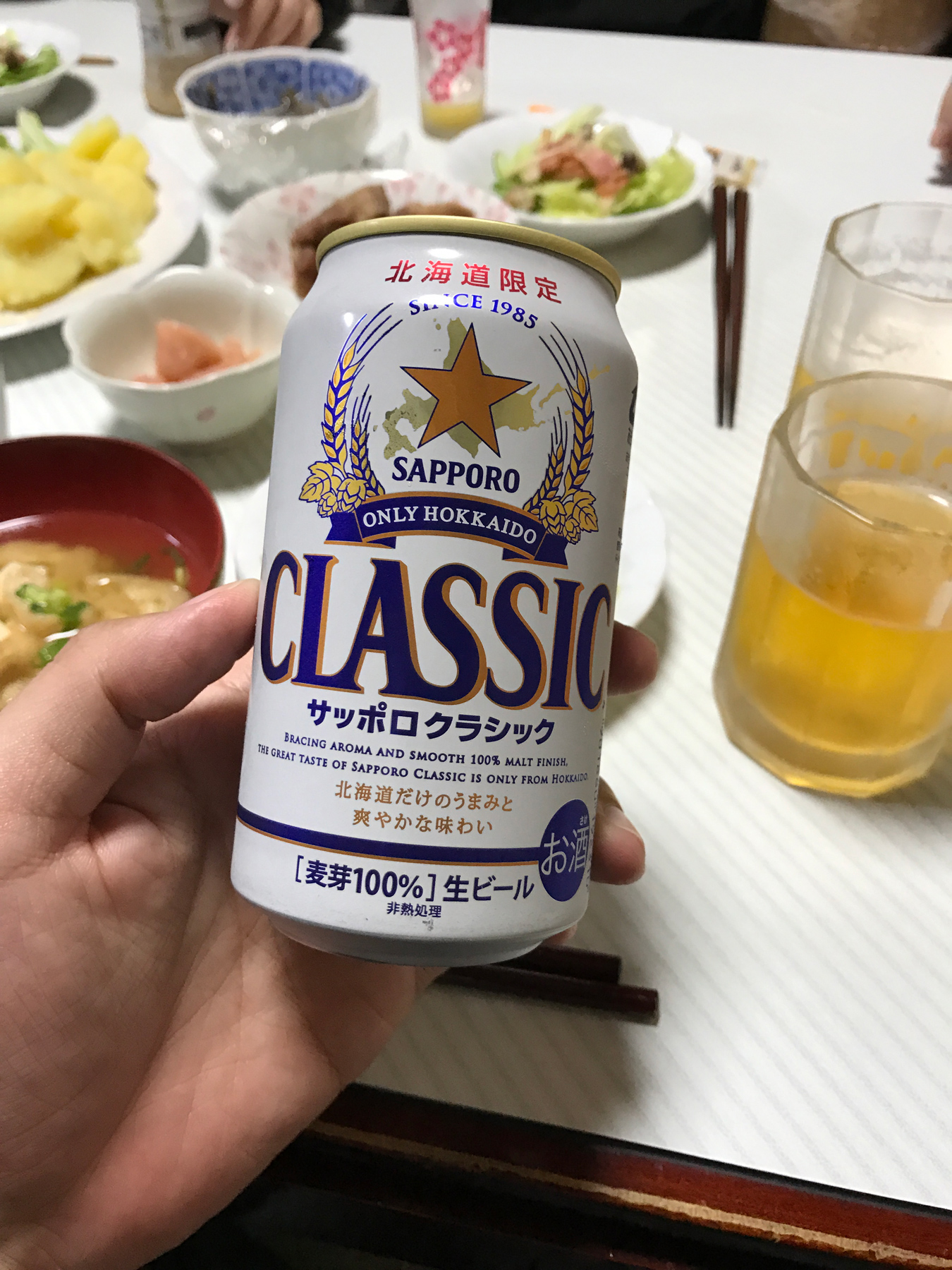 Dinner made by my mom featuring a can of beer that my brother-in-law brought back from Hokkaido.