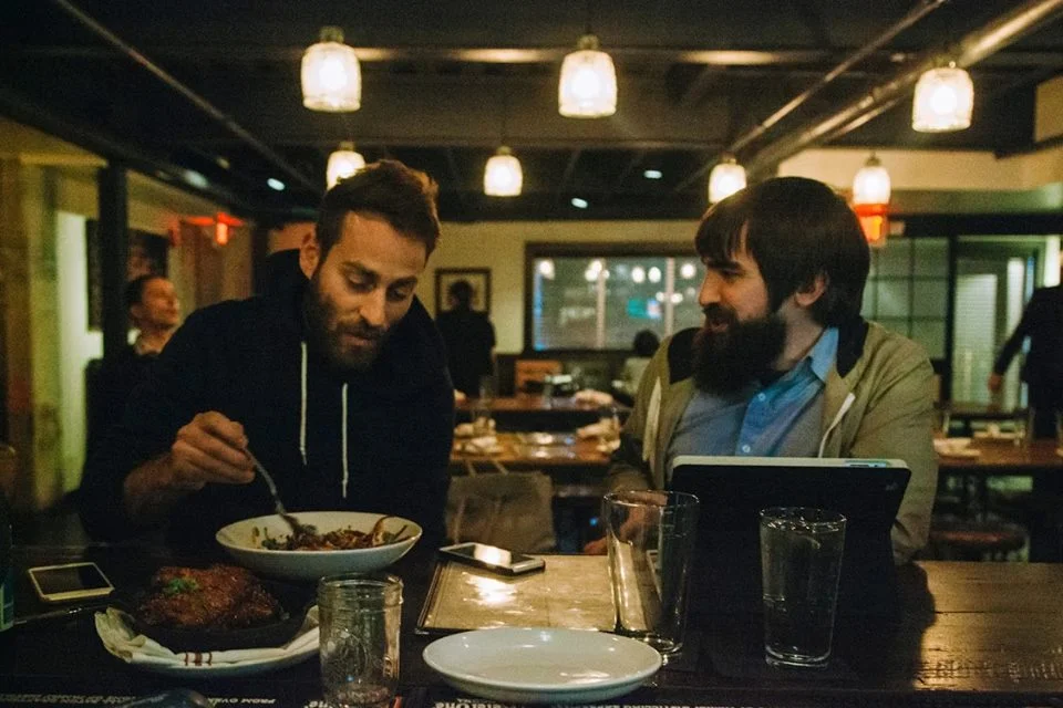 Mike Kinsella chows down his complimentary meal before playing at The Sinclair in Cambridge, Mass. while John interviews him through fanboy anxiety. Photo by Sasha Padro